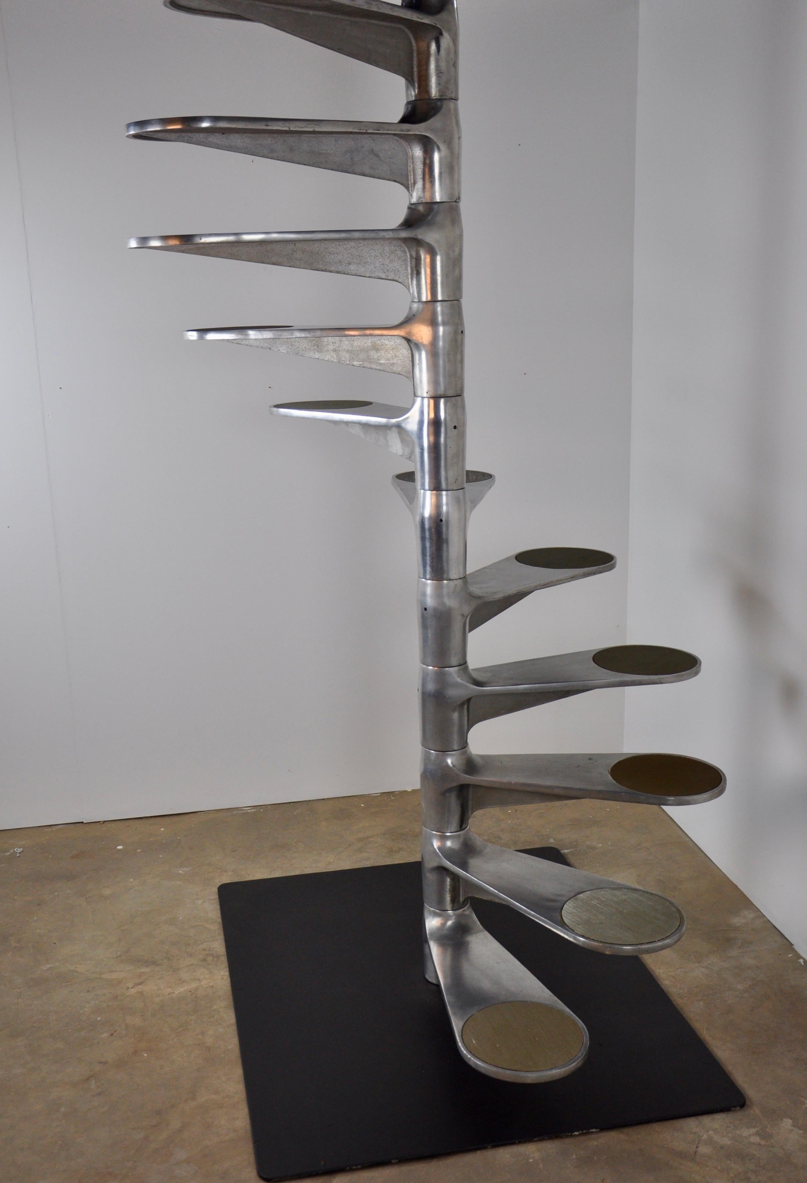 Helical staircase by Roger Tallon for Galerie Lacloche, 1980 composed of 19 steps step height 20cm x 70cm total length 380cm.