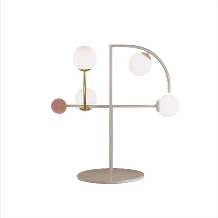 Part ambient light, part artwork, Helio table lamp will highlight any space in all the right ways thanks to its opal glass globes and sleek brass details. Made to order and color customizable.

A collection that is raw and expressive yet