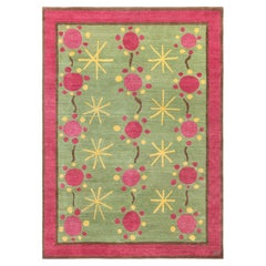 „Heliobloom“ – Handgefertigter Wollteppich im modernen Art-déco-Stil mit Blumen- und Oliver-Motiv von Doris Leslie Blau