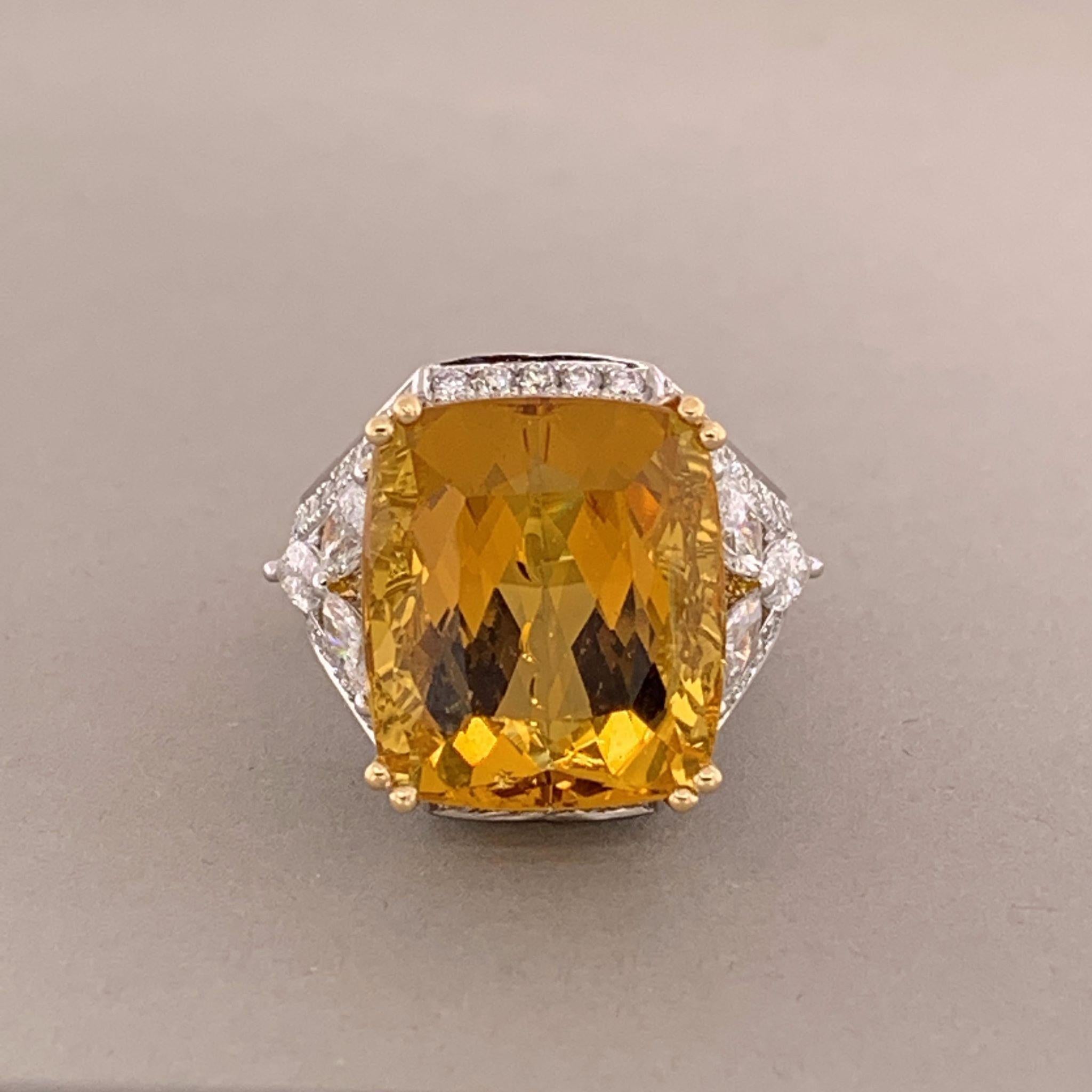 Heliodor is the yellowish-orange to orangy-yellow variety of the beryl family which has a wide variety of popular gems including emerald (green), aquamarine (blue) and morganite (light pink). The heliodor weighs in at 16.89 carats and is shaped in a