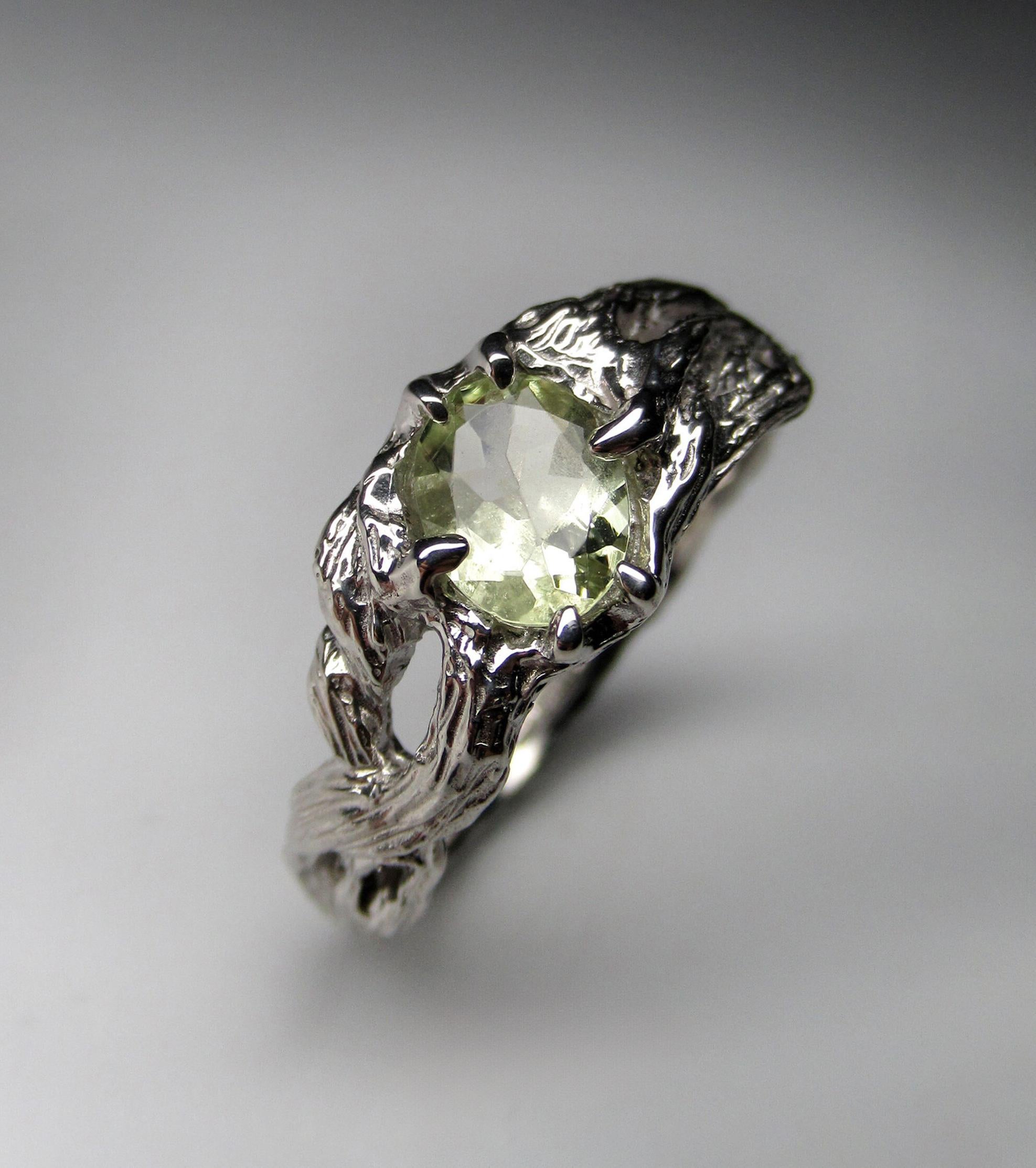 Silver ring with natural Heliodor Yellow Beryl  
gemstone origin - Brazil
gem size is 0.12 x 0.2 x 0.28 in / 3 x 5 x 7 mm
heliodor weight - 0.55 carat
ring size - 8 US
ring weight - 2.98 grams