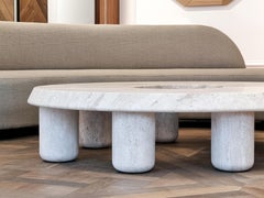 Table basse contemporaine sculpturale Helios en travertin par Michel Amar