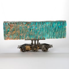 Helios, iridescent cast glass & model train steam chassis sculpture by Jon Lewis