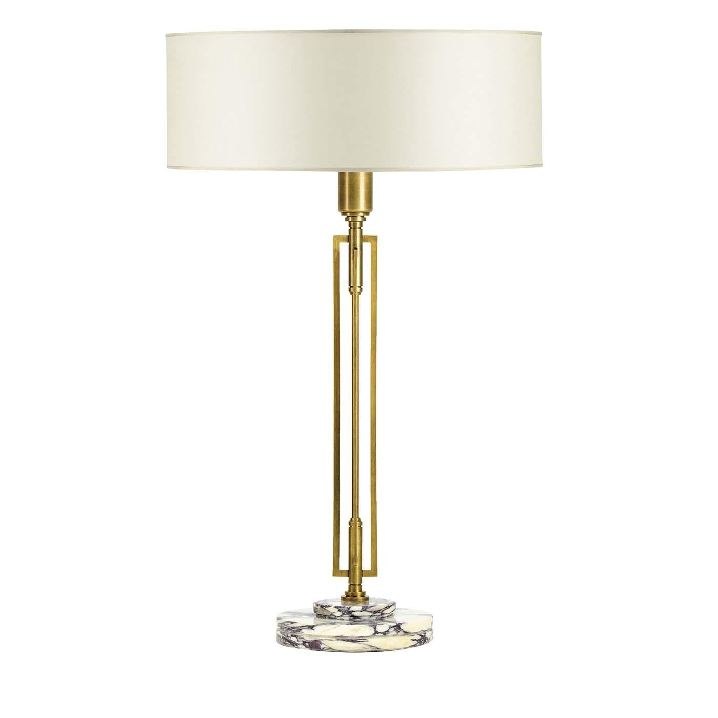 A perfect pick for midcentury and contemporary interiors alike, this table lamp showcases a streamlined design with a steel structure on a round base made of Breccia Viola marble with a stunning creamy-white color with veins of gold, tan, and grey.