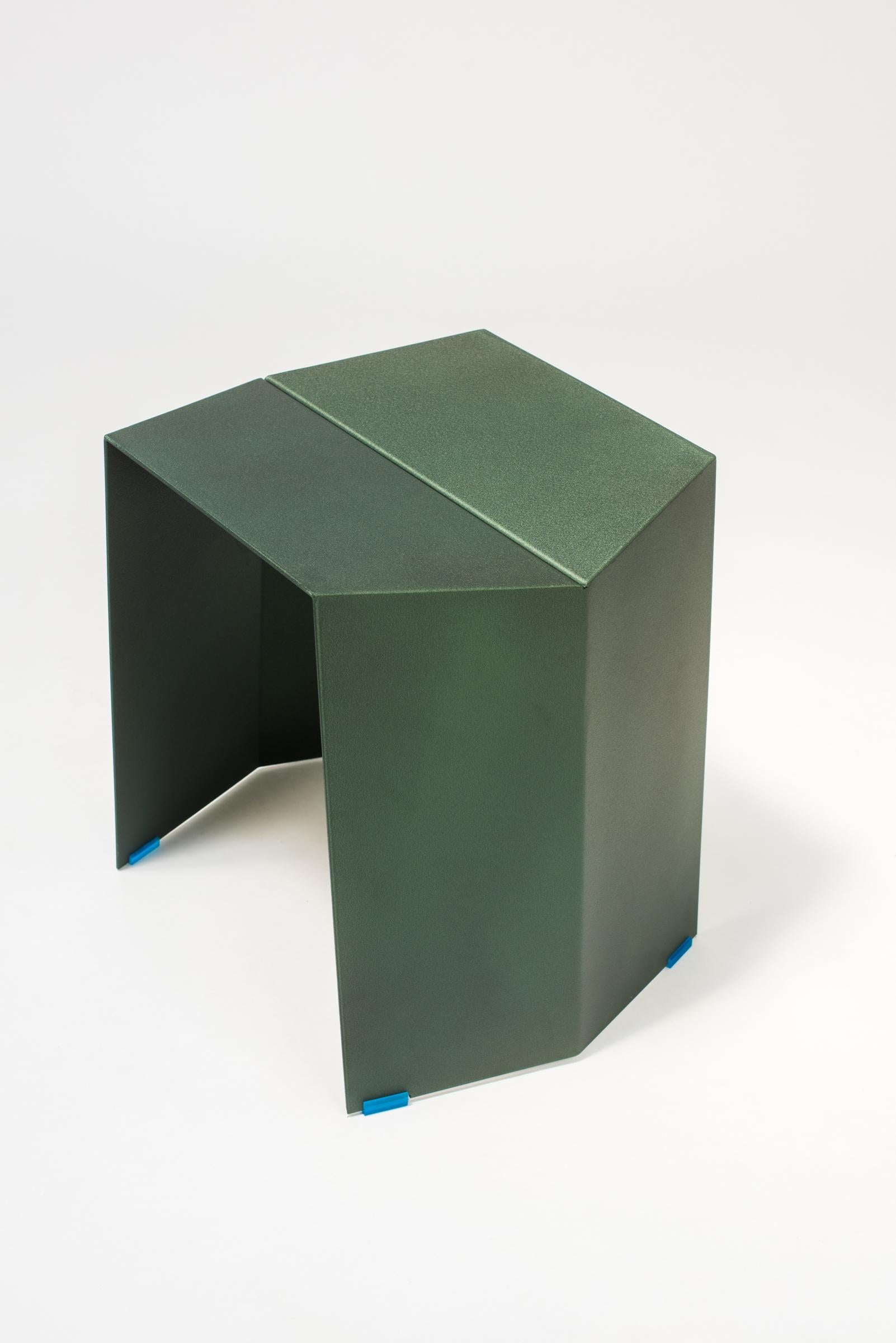 The Helium stool is a lightweight aluminum stool finished in a durable powdercoat that is suitable for interior and exterior use. Multiples can be stacked as shown in photos. Standard colors are bronze, emerald moss, midnight blue, and forest green.