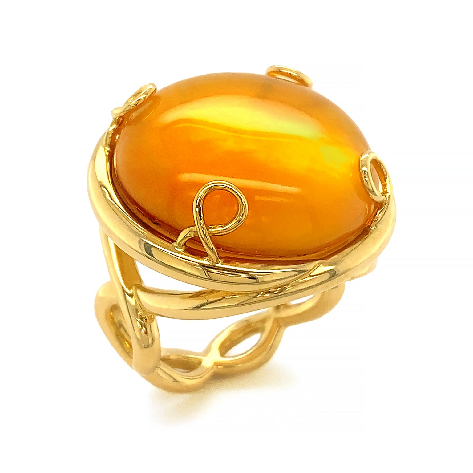 Light expresses several ways in this ring. The body is 18k yellow gold with twisted prongs and a criss-cross helix shank. A strong polish makes the precious metal mirror bright. The upper stone is a bright orange citrine carved into a 22mm round