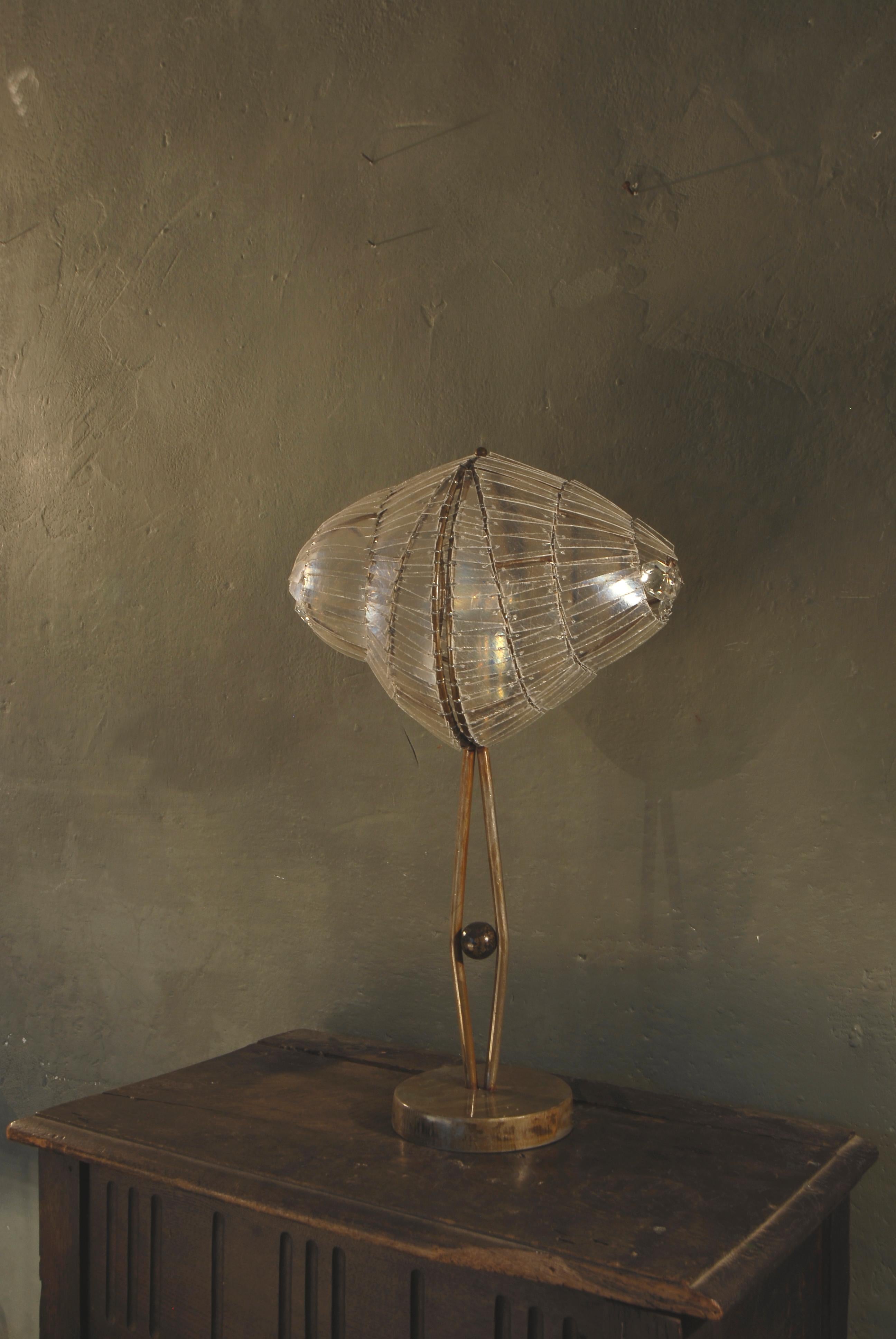 Helix Table Lamp by Valentina Giovando
Dimensions: D 30 x H 55 cm.
Materials: Crystal, Fiberglass, Iron.  

Valentina Giovando, Lives and works in Sarzana, in Liguria, and for over 20 years she dedicated herself to the production of a new style. Her
