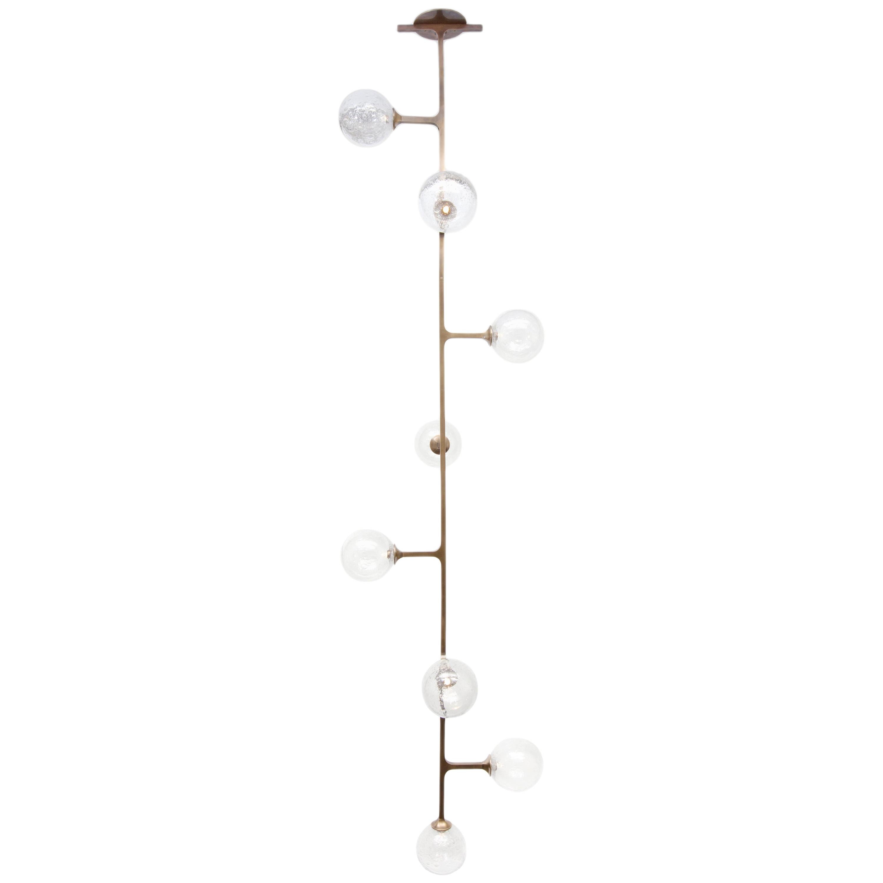 Helix Vertical 7-Tier Pendant - patinated brass & hand blown glass For Sale