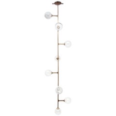 Helix Vertical 7-Tier Pendant - patinated brass & hand blown glass