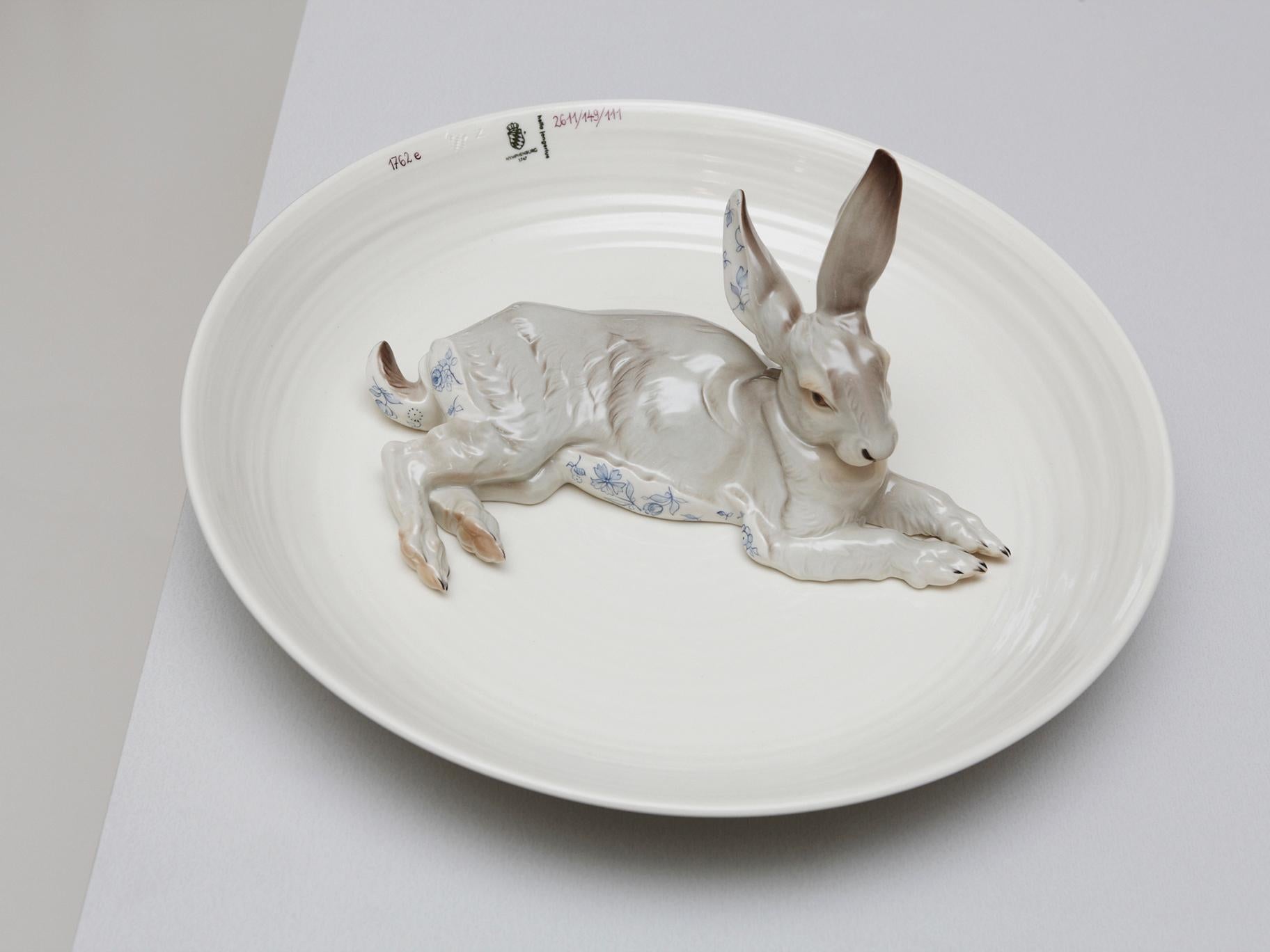 This is one of a series of animal bowls designed for Nymphenburg Porcelain Manufactory by Hella Jongerius. The large bowl with a rabbit adorned in a blue floral pattern is the perfect object of discussion. As a decorative object, a fruit bowl or as