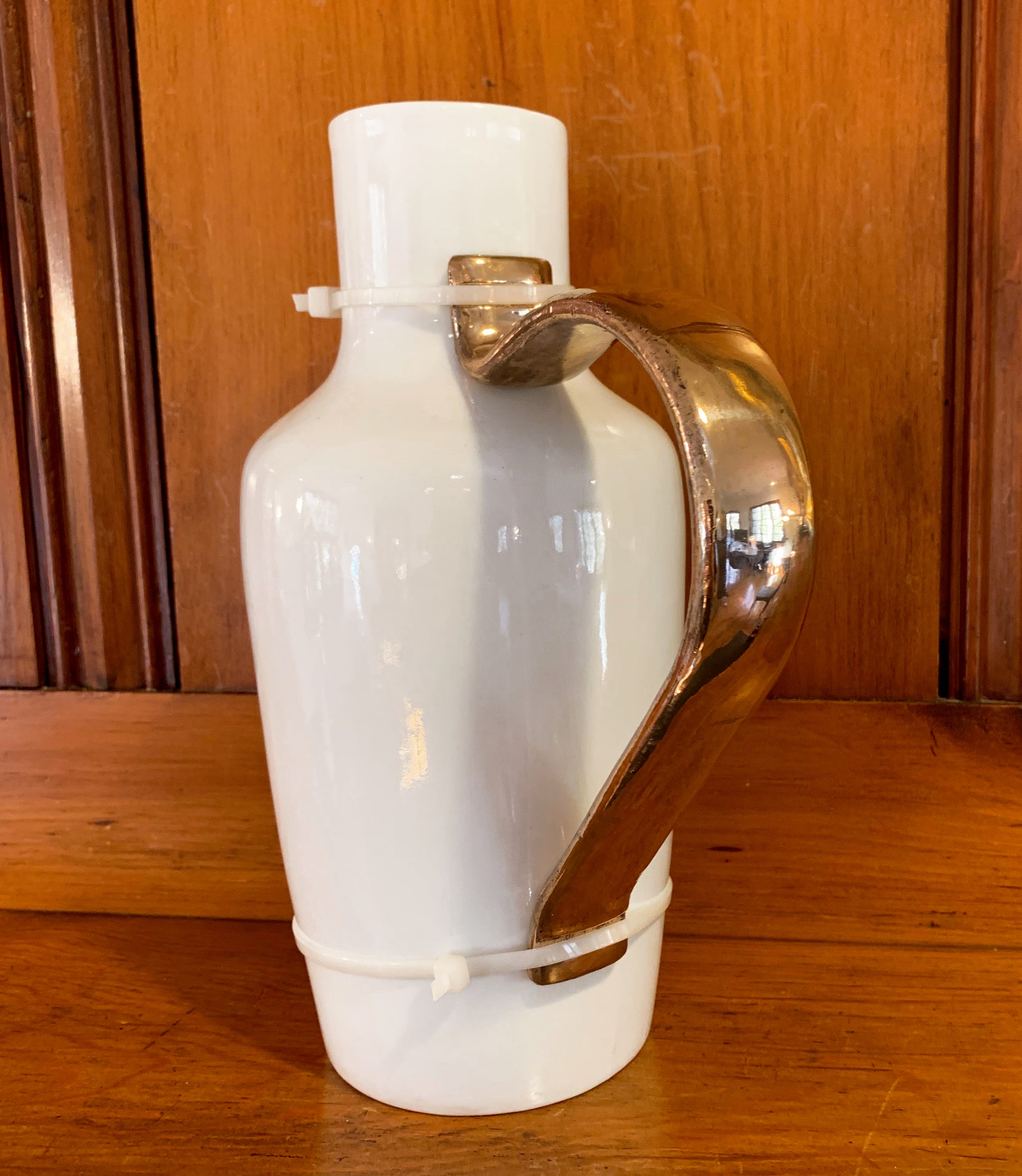 This ‘repurposed water jug’ is in the permanent collections of many museums, including the V&A in London, which describes it this way:

“Designer Hella Jongerius (1963) is one of the most celebrated and imaginative designers of the last twenty