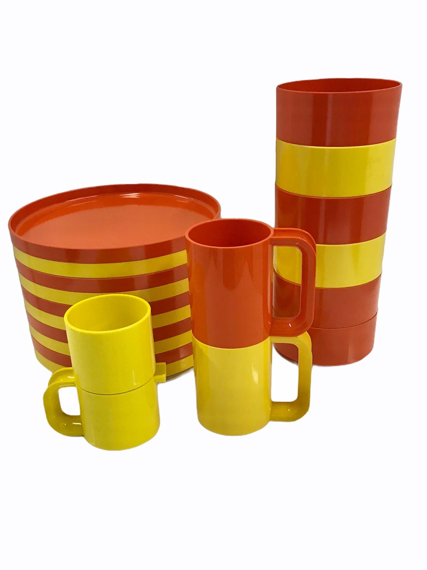 REDUCED FROM $325....Designed by Massimo and Lella Vignelli for Heller in 1964 max 2 yellow and orange ABS dinnerware set. They were originally manufactured in Italy until 1971 when production moved to the United States. All pieces of this