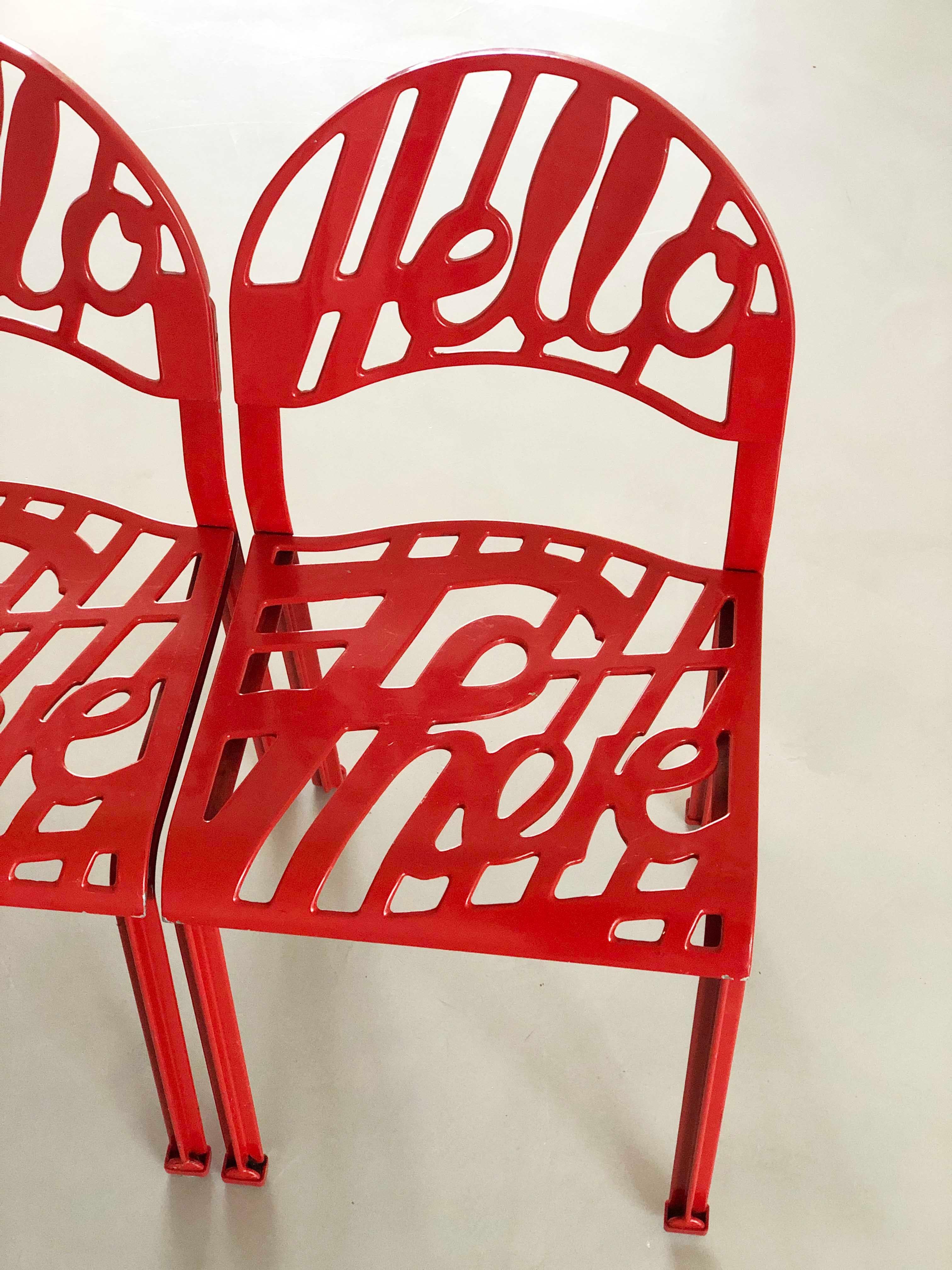 1 vintage Artifort 'Hello There' chairs. An iconic pop art style design by Jeremy Harvey for Artifort. Each are made of cast aluminum then powder coated. This allows the chair to be used both indoors and outdoors. The seats are cast aluminum and red