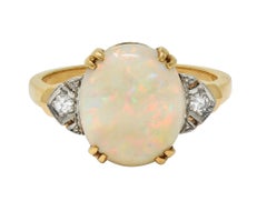 Helm & Hahn Co. Anillo Art Decó de oro de 14 quilates con tres piedras y diamantes opalescentes