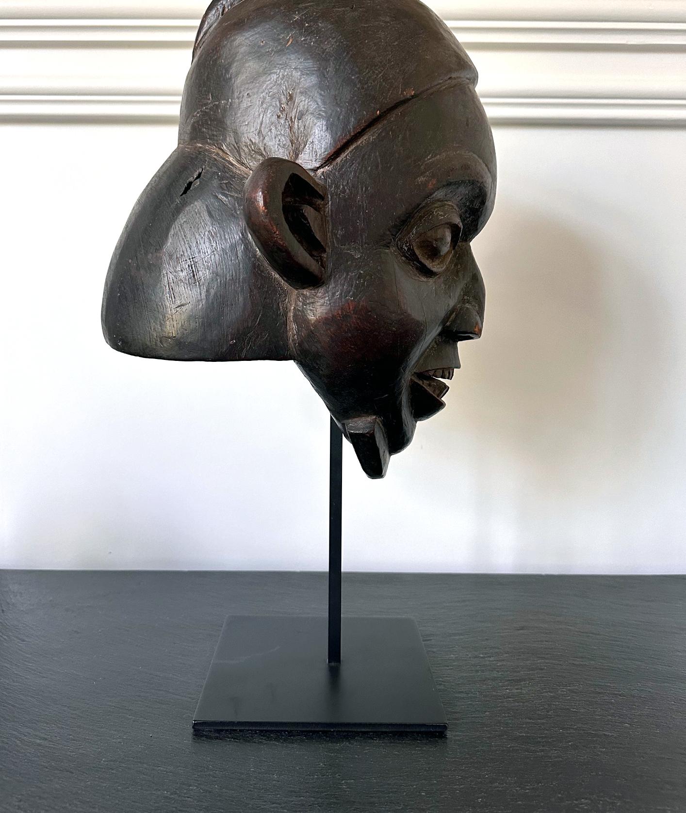 Hand-Carved Helmet Crest Ngoin Mask from Cameroon Africa For Sale