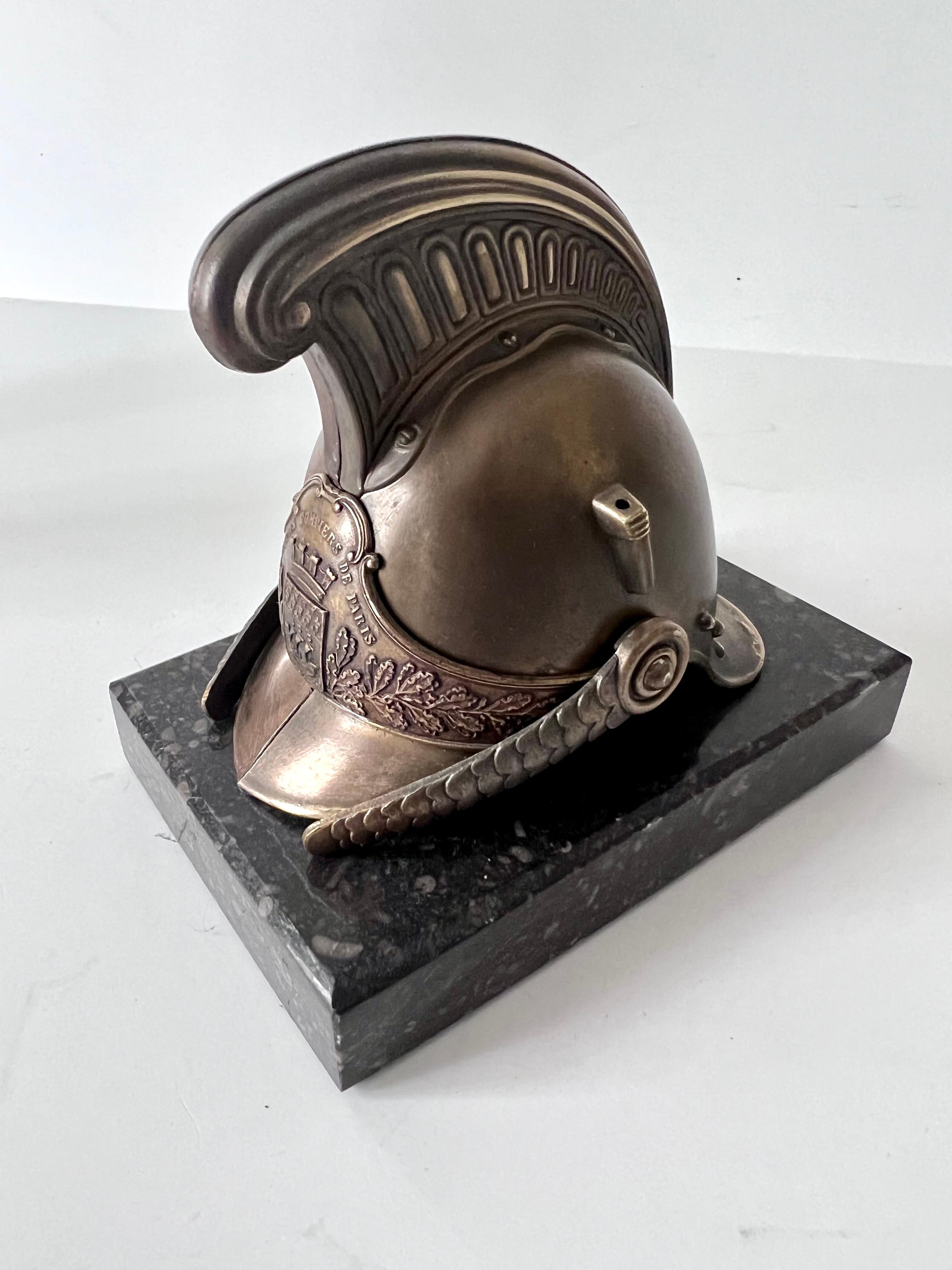 Patinated Helmet Paperweight Mounted on a Piece of Marble Paris France For Sale