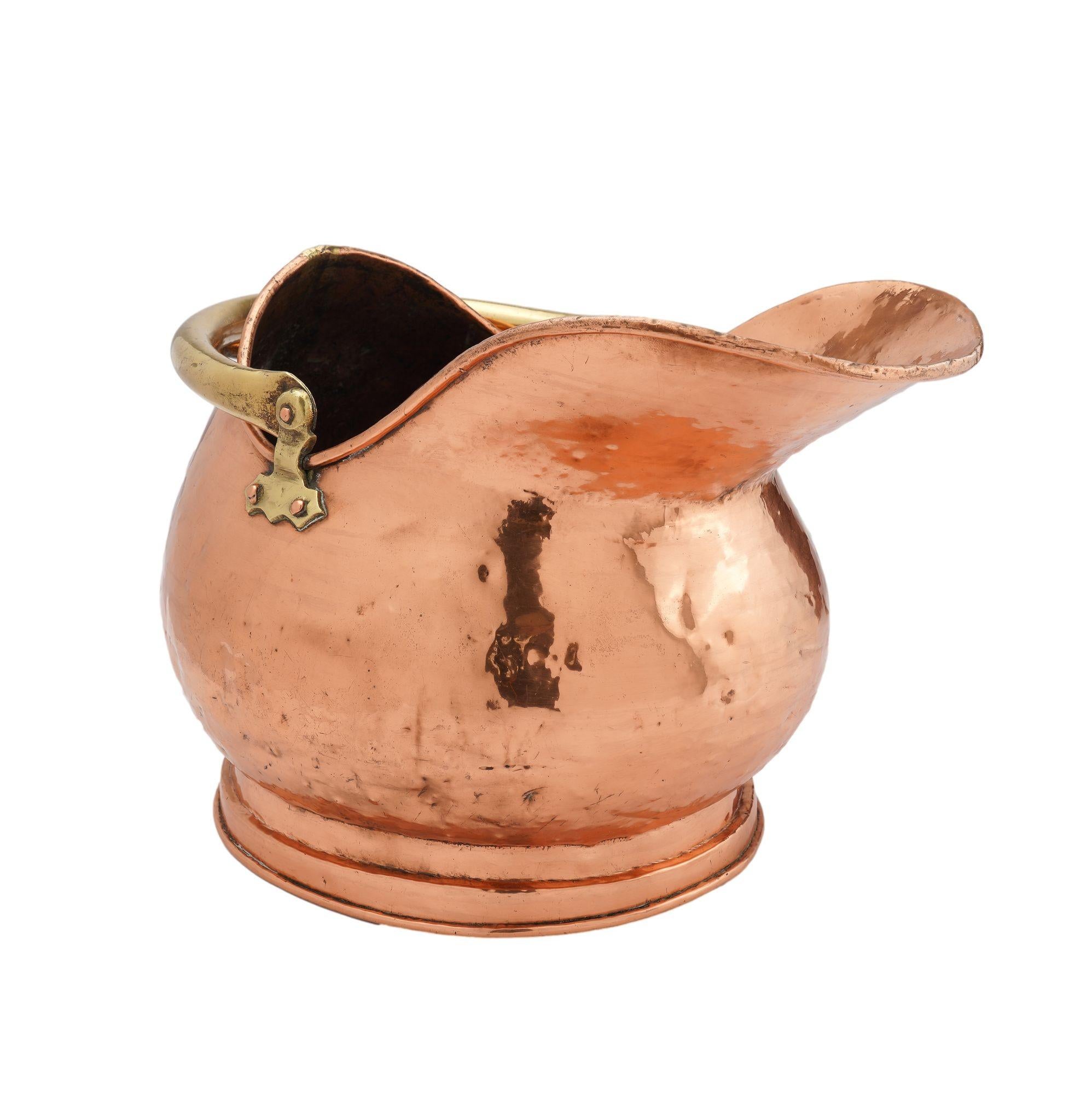 Helmet shaped copper coal hod on a circular footed base, 1800's For Sale 1