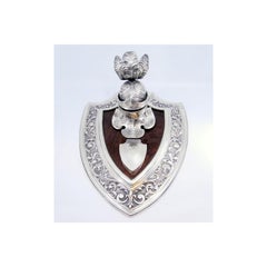 Helmet-shaped silver inkwell on rosewood with shells & stamp box