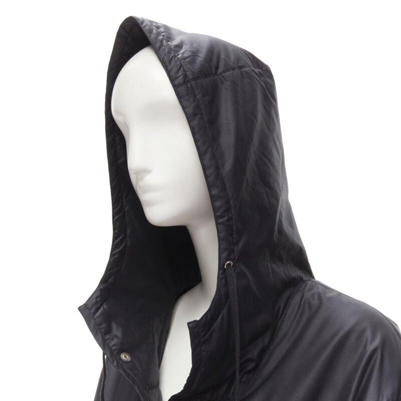 HELMUT LANG black hooded pocketed cutout armhole jacket IT40 S
Reference: CAWG/A00239
Brand: Helmut Lang
Designer: Helmut Lang
Material: Polyester
Color: Black
Pattern: Solid
Closure: Snap Buttons
Lining:  Polyester
Extra Details: Cutout armhole