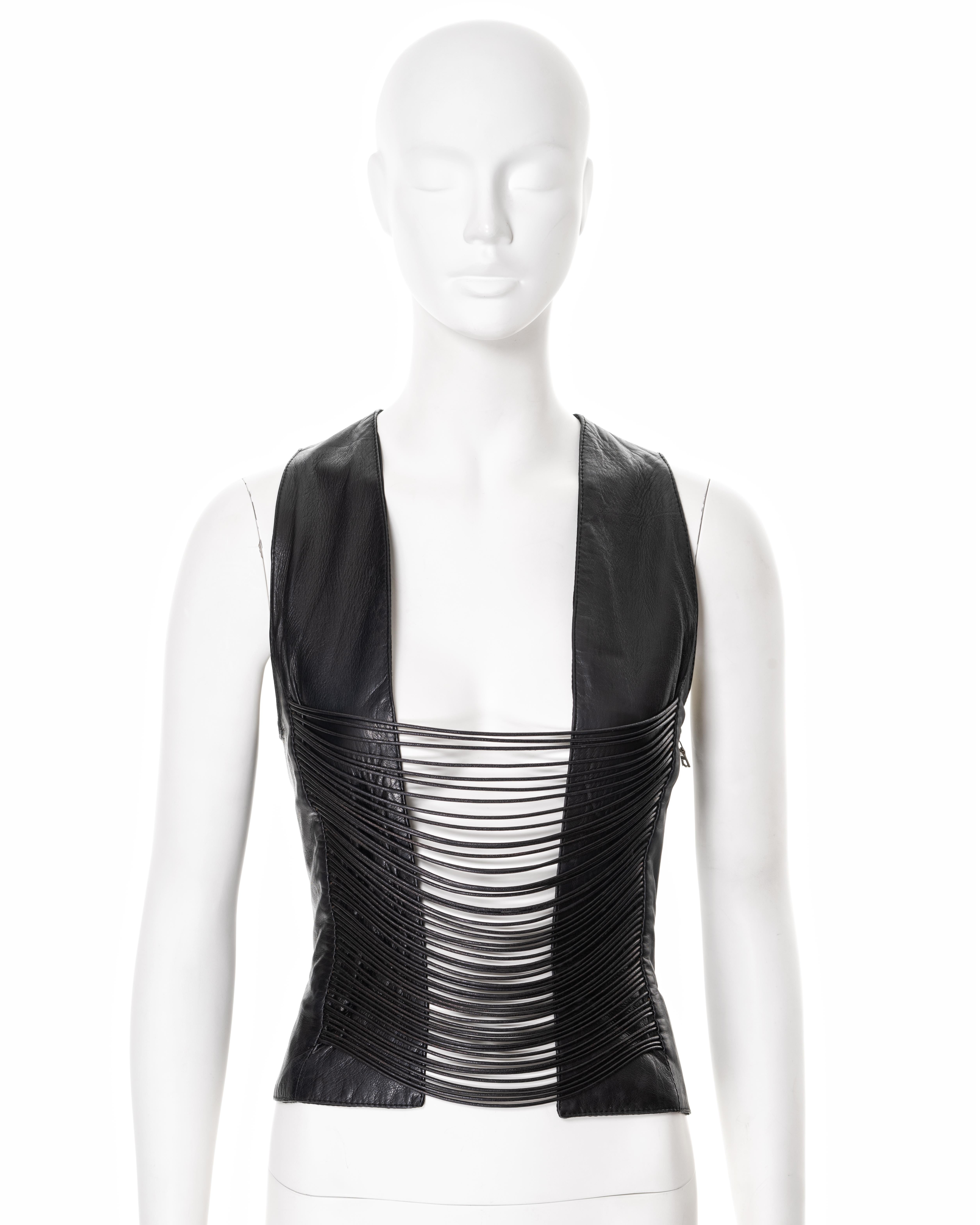 ▪ Helmut lang leather waistcoat / corset top
▪ Fall-Winter 1992 
▪ Open front with leather lacing 
▪ Zip at side seam opening 
▪ IT 42 - FR 38 - UK 10 - US 6
▪ Made in Italy

All photographs in this listing EXCLUDING any reference or runway imagery
