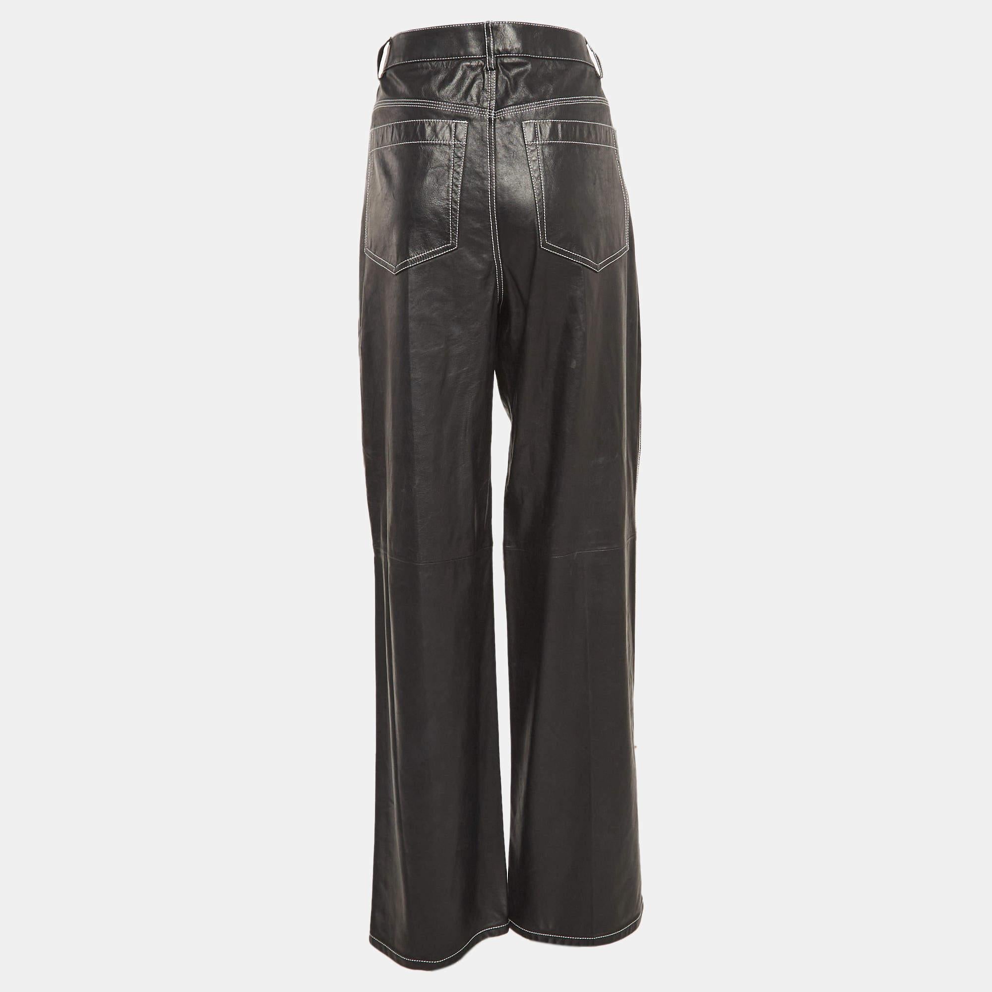 The Helmut Lang pants offer a sleek and modern look with their minimalist design. Crafted from premium black leather  they feature a straight leg cut that exudes effortless sophistication. These pants are perfect for day to night transitions 