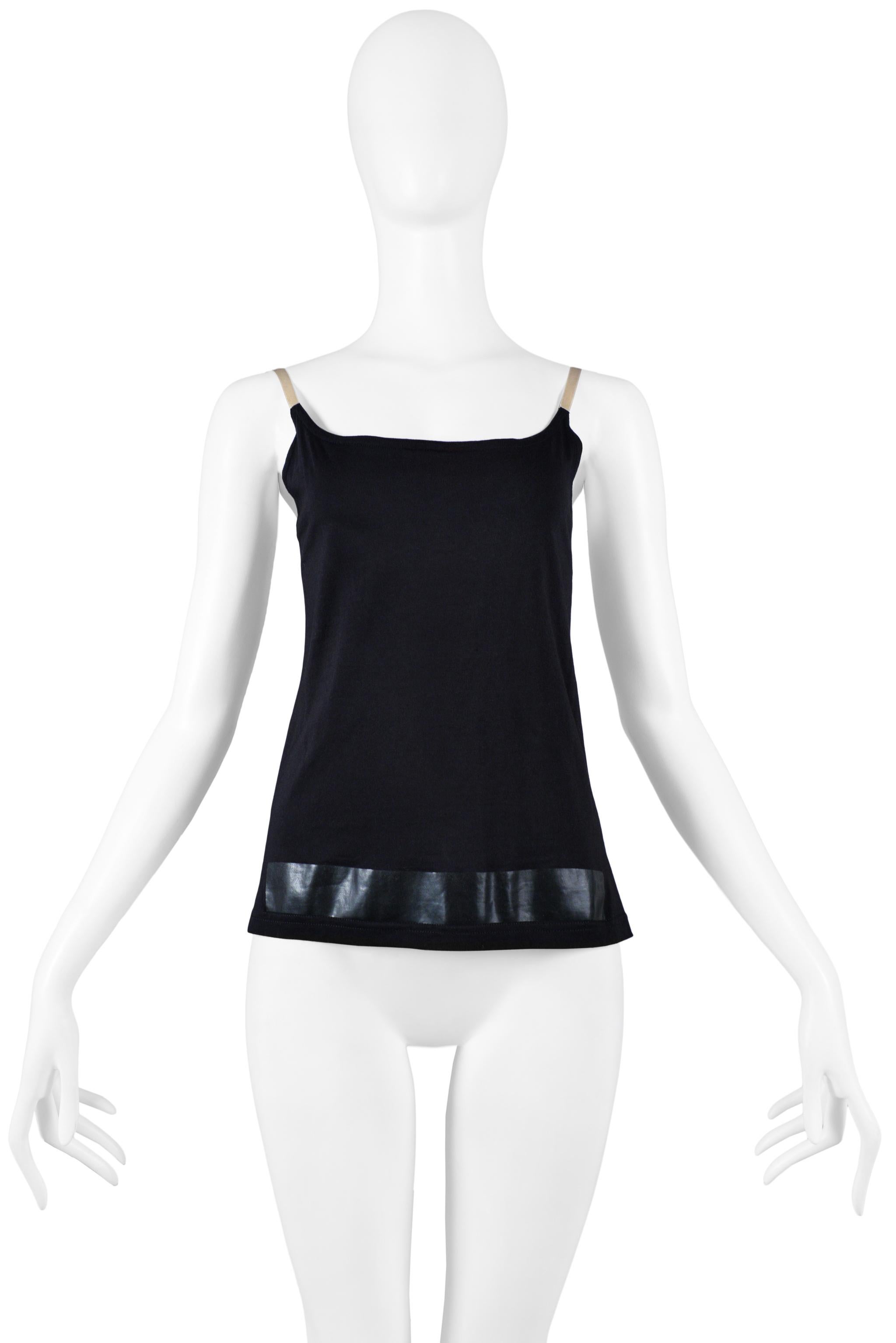 Resurrection Vintage is excited to offer a vintage Helmut Lang black cotton knit tank top featuring a black stripe and nude straps. From the 1996 collection. 

Helmut Lang 
Size M
Cotton Jersey
1996 Collection 
Excellent Vintage Condition