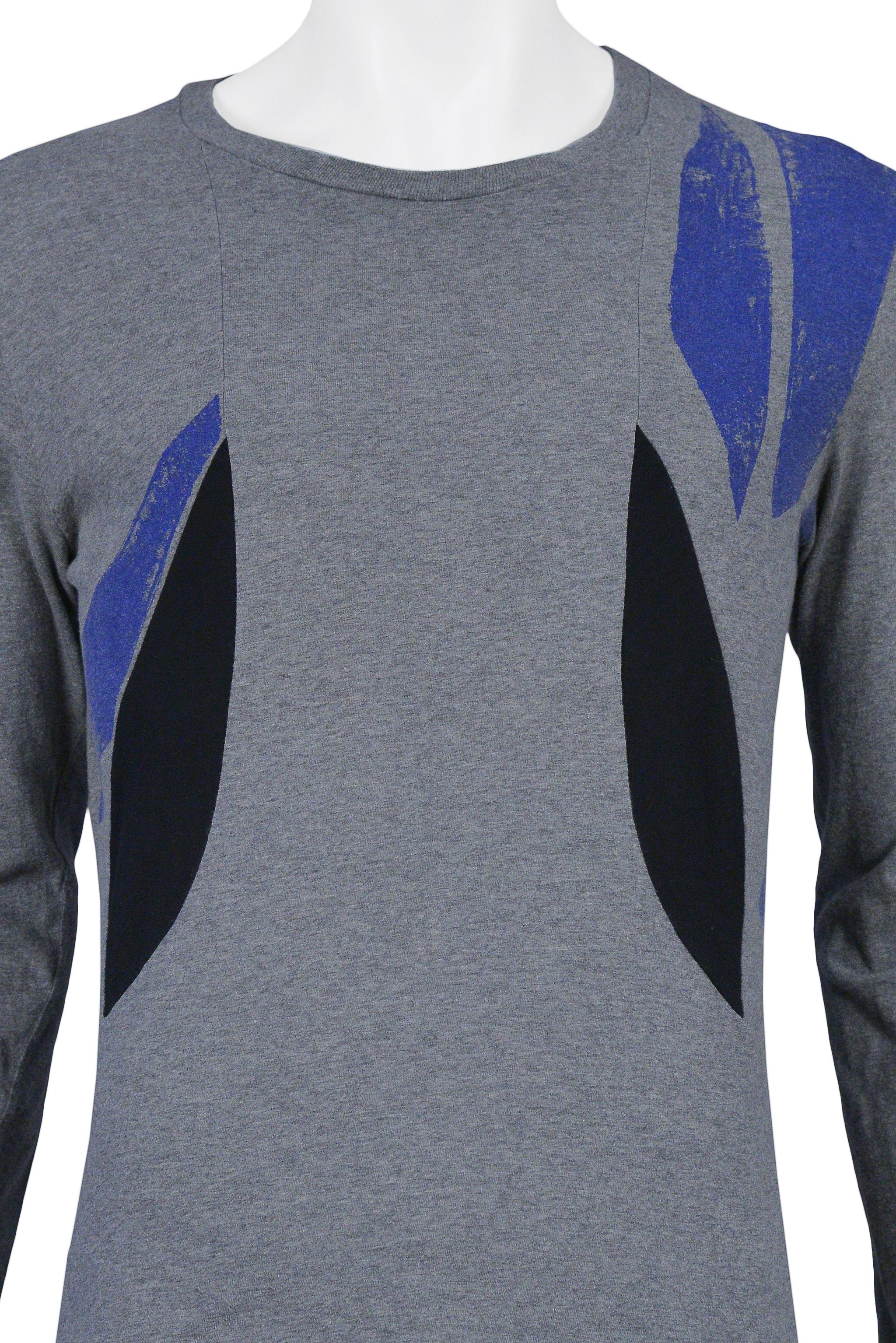 Resurrection Vintage is excited to offer a vintage heather grey cotton Helmut Lang men's long sleeve t-shirt featuring a crew neck, slim body, abstract blue paint splatter graphic, black insets, and black fabric flaps that hang from the inside of