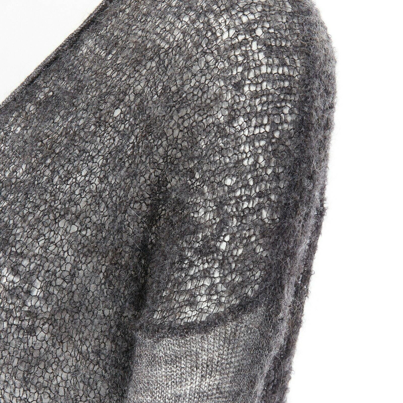 HELMUT LANG grey charcoal boucle knit mesh drop shoulders asymmetrical sweater P 
Reference: WEYN/A00352 
Brand: Helmut Lang 
Designer: Helmut Lang 
Material: Alpaca 
Color: Grey 
Pattern: Solid 
Extra Detail: Mesh sweater. Dropped shoulders. Round