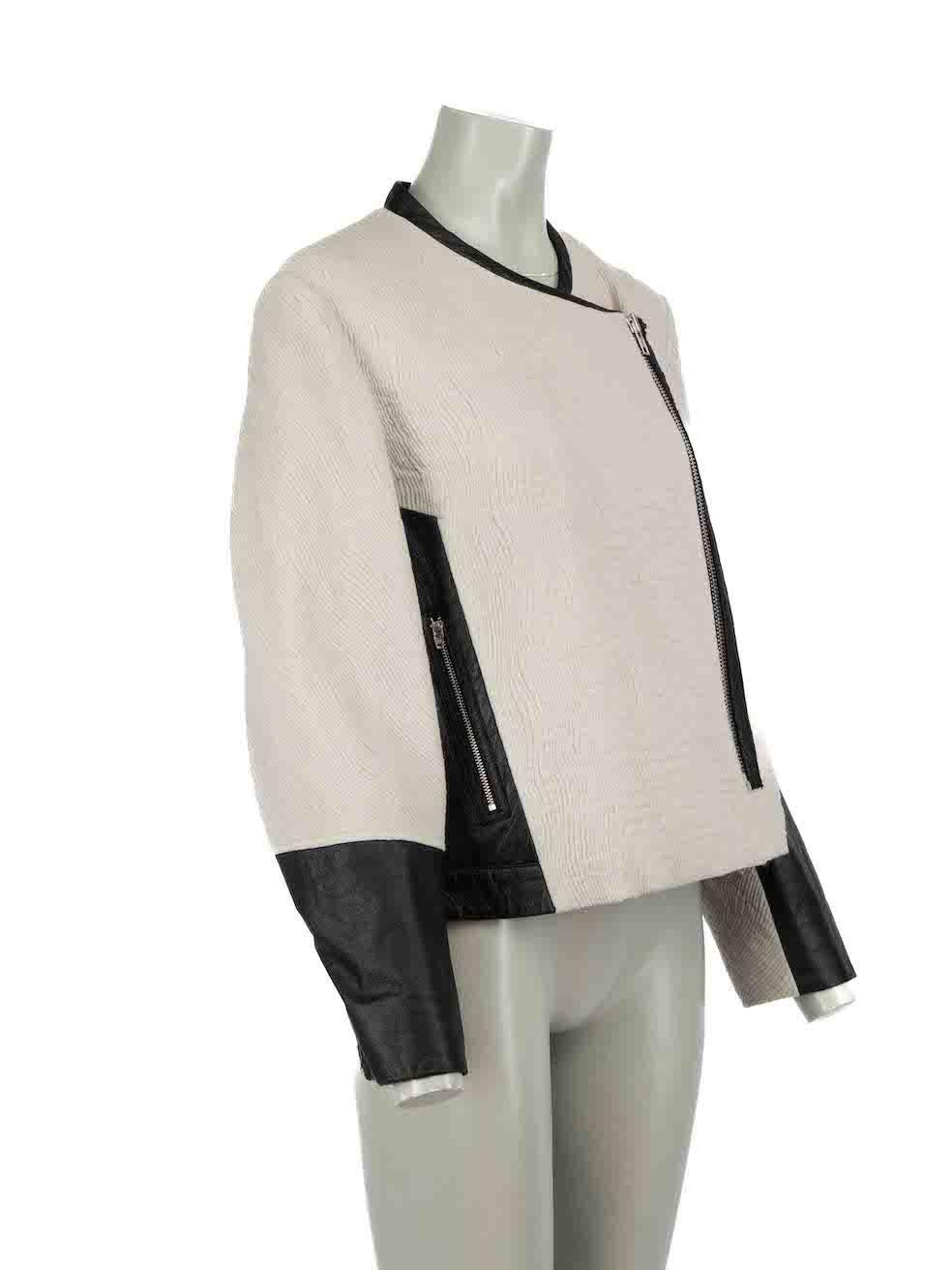 CONDITION is Very good. Minimal wear to jacket is evident. Minimal pilling to outer fabric on this used Helmut Lang designer resale item.
 
 Details
 Grey
 Wool
 Biker jacket
 Textured
 Leather panelled accent
 Front asymmetric zip closure
 2x Front