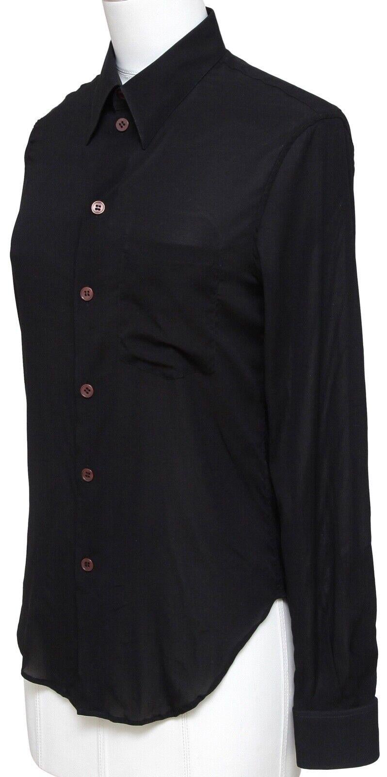 GUARANTEED AUTHENTIC HELMUT LANG BLACK SILK LONG SLEEVE BUTTON DOWN BLOUSE

Any white spots are from camera lighting.

Design:
  - Beautiful rich black silk button down blouse.
  - Long sleeve, button down front and at cuffs.
 
Fabric: 90% Silk, 10%