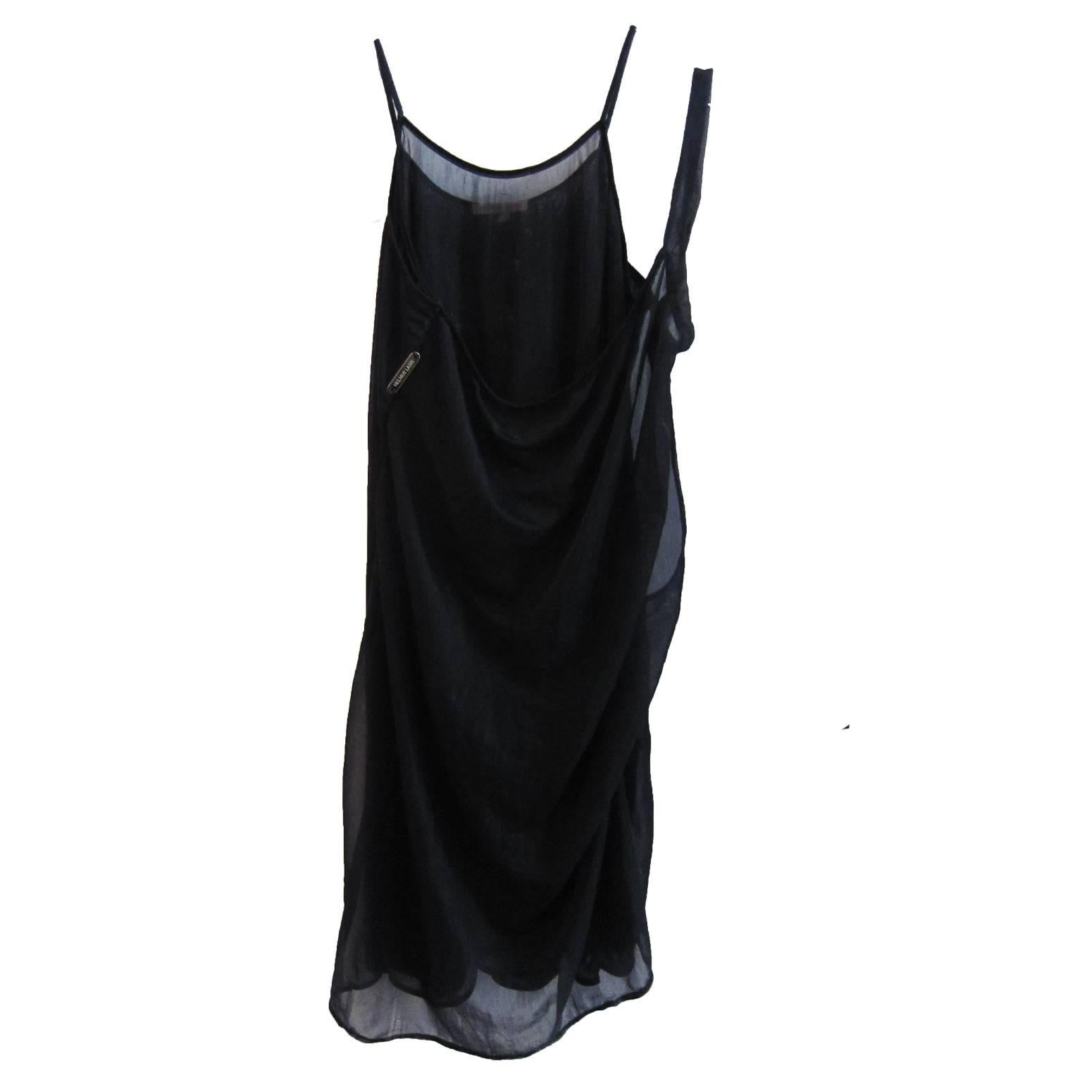 Helmut Lang archive asymmetric dark navy dress from SS 1995.
Size : It 40, US 6 