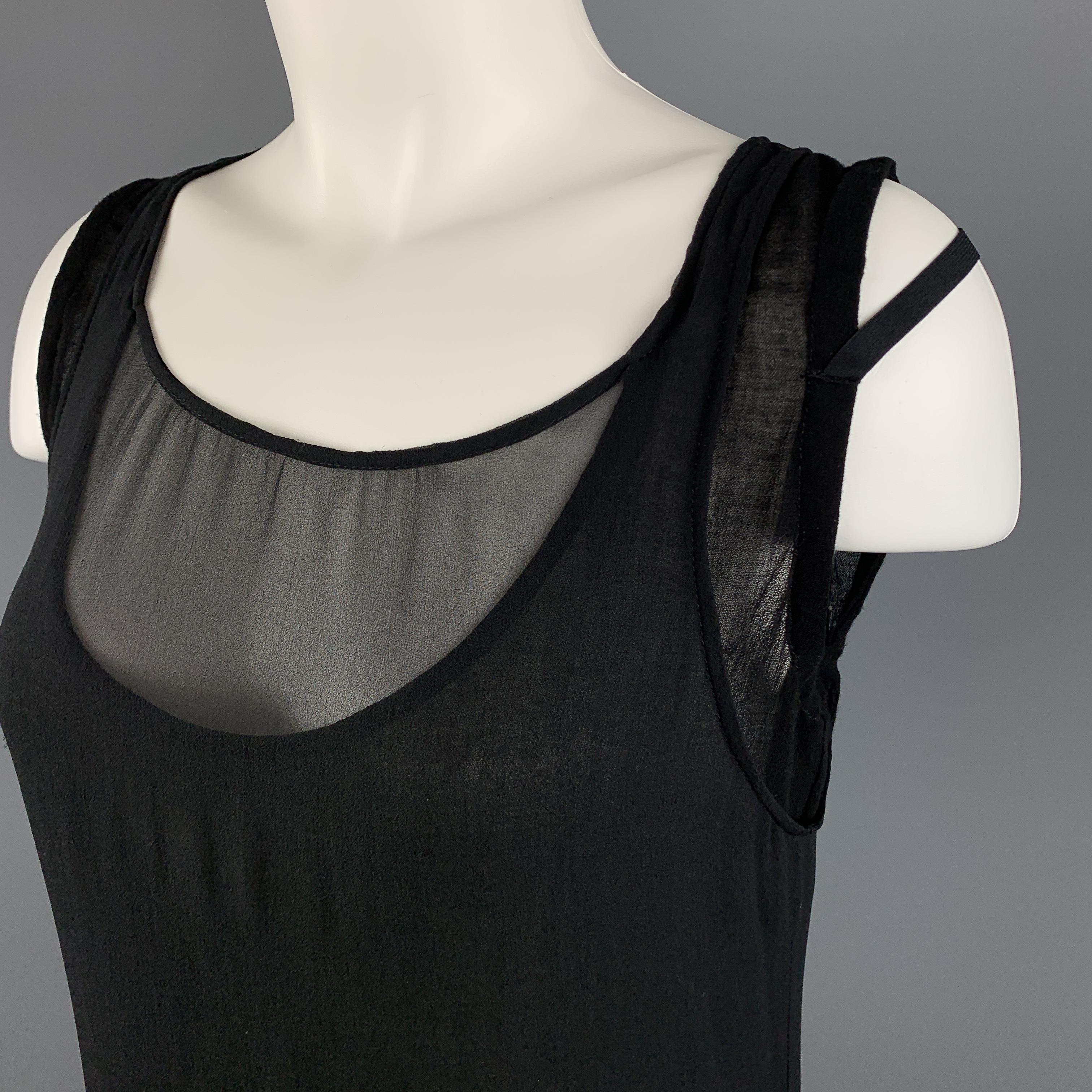 HELMUT LANG dress features layered chiffon and burnout tank tops, with a bubble hem, and side strap. Made in USA.

Excellent Pre-Owned Condition.
Marked: 2

Measurements:

Shoulder: 14 in.
Bust: 36 in.
Waist: 34 in.
Hip: 42 in.
Length: 38 in.