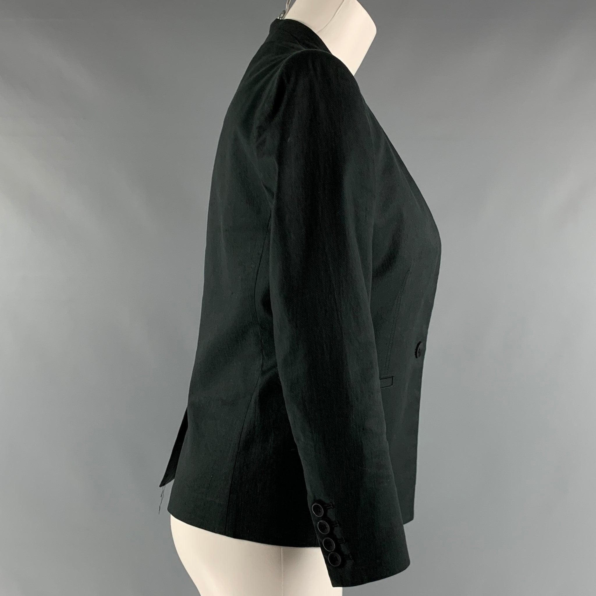 HELMUT LANG blazer comes in grey cotton blend twill material with a deep V neck, single breasted button front, and welt pockets. Excellent Pre-Owned Condition. 

Marked:   2 

Measurements: 
 
Shoulder: 15 inches Bust: 36 inches Sleeve: 20.5 inches