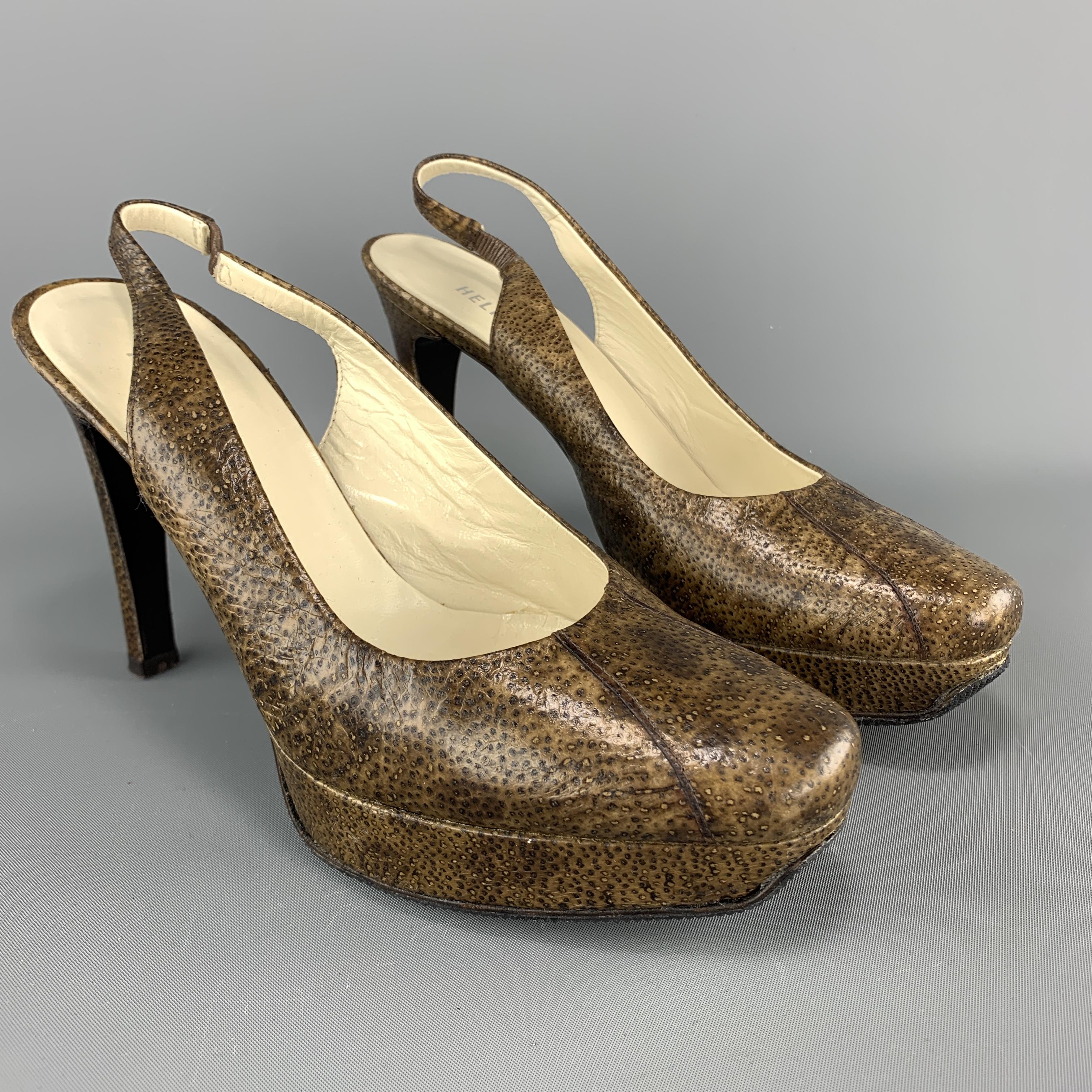 HELMUT LANG pumps com in brown textured leather with a squared point platform toe, slingback, and covered heel. Made in Italy.

Excellent Pre-Owned Condition.
Marked: IT 35.5

Measurements:

Heel: 4.25 in.
Platform: 0.75 in.