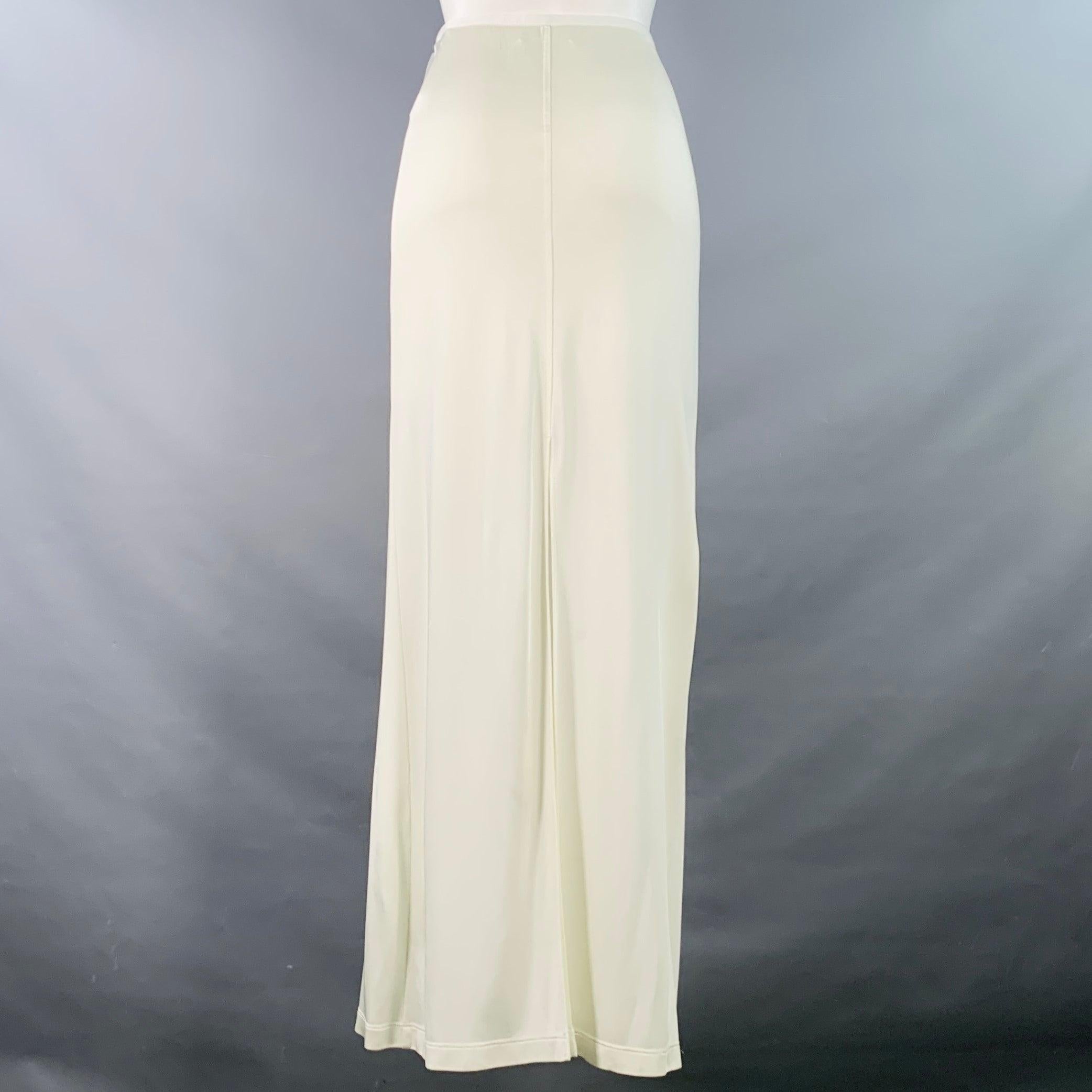 Jupe HELMUT LANG
en jersey beige, avec une longueur maxi et une ceinture élastique. Marques modérées difficiles à voir, étiquettes enlevées. En l'état. 

Marqué :   taille non indiquée 

Mesures : 
  Taille : 30 - 34 pouces Hanche : 38 pouces