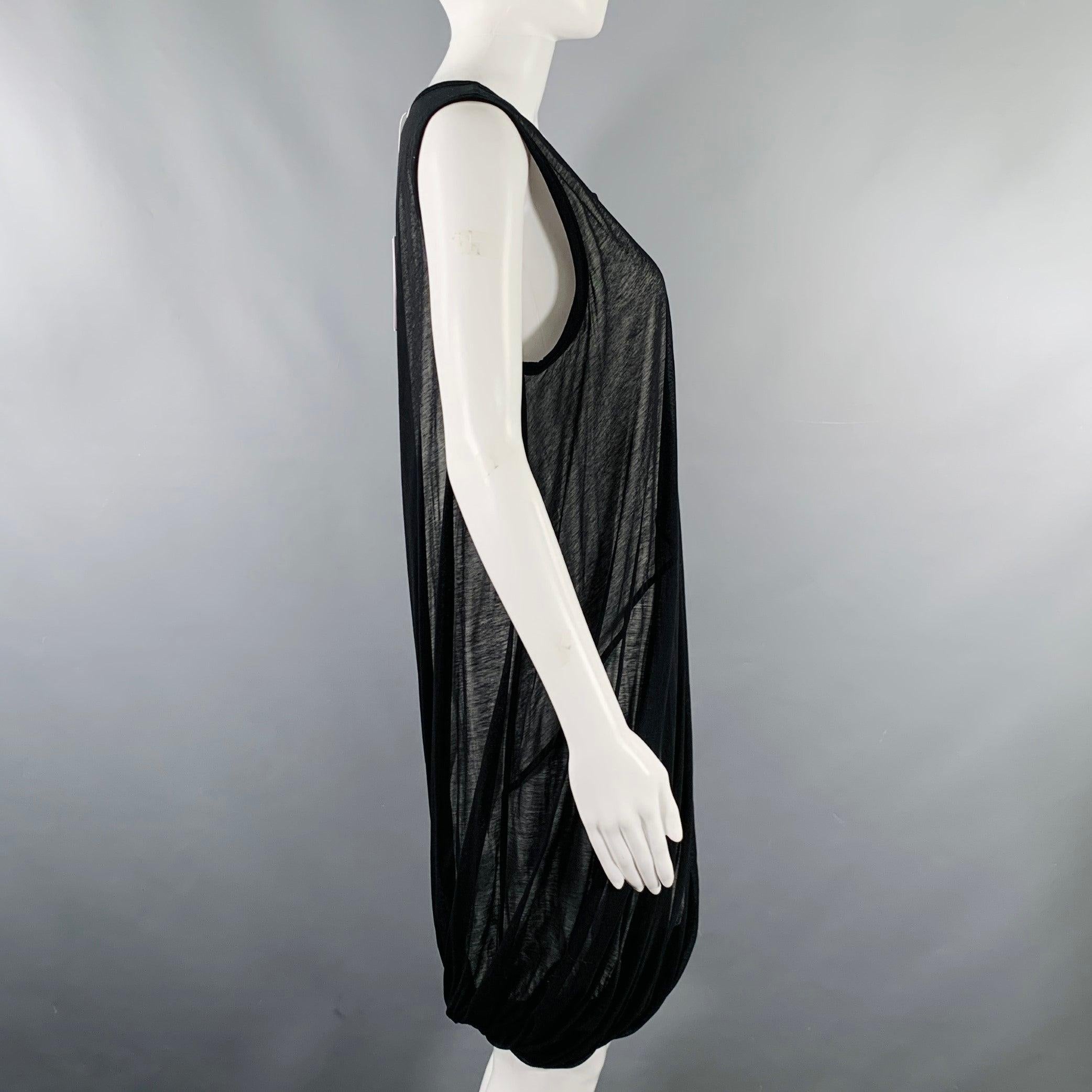 HELMUT LANG dress
in a black and white cotton featuring a sheer black top layer, sleeveless style, and bubble hem. New with Tags. 

Marked:   M 

Measurements: 
 
Shoulder: 14.5 inches Bust: 38 inches Waist: 32 inches Hip: 34 inches Length: 35