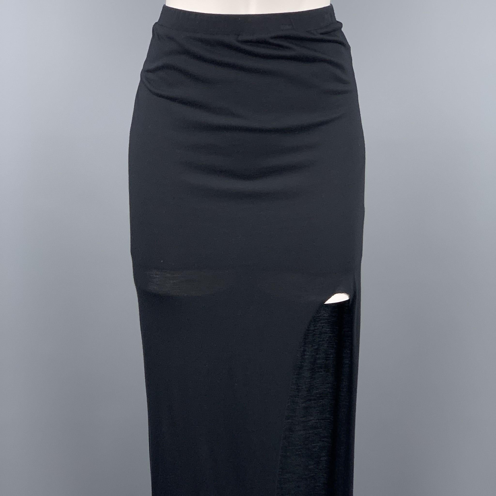 HELMUT LANG skirt comes in a black jersey modal blend featuring a maxi style, asymmetrical design, and a elastic waistband. Made in USA.

Very Good Pre-Owned Condition.
Marked: S

Measurements:

Waist: 28 in. 
Hip: 34 in. 
Length: 43 in. 