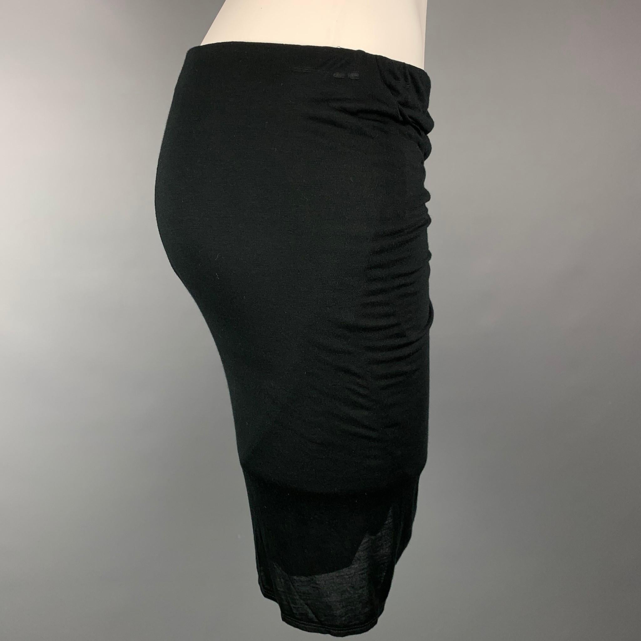 HELMUT LANG mini skirt comes in a black jersey modal featuring a ruched design anda elastic waistband.

New With Tags. 
Marked: S
Original Retail Price: $195.00

Measurements:

Waist: 29 in.
Hip: 34 in.
Length: 21 in. 


