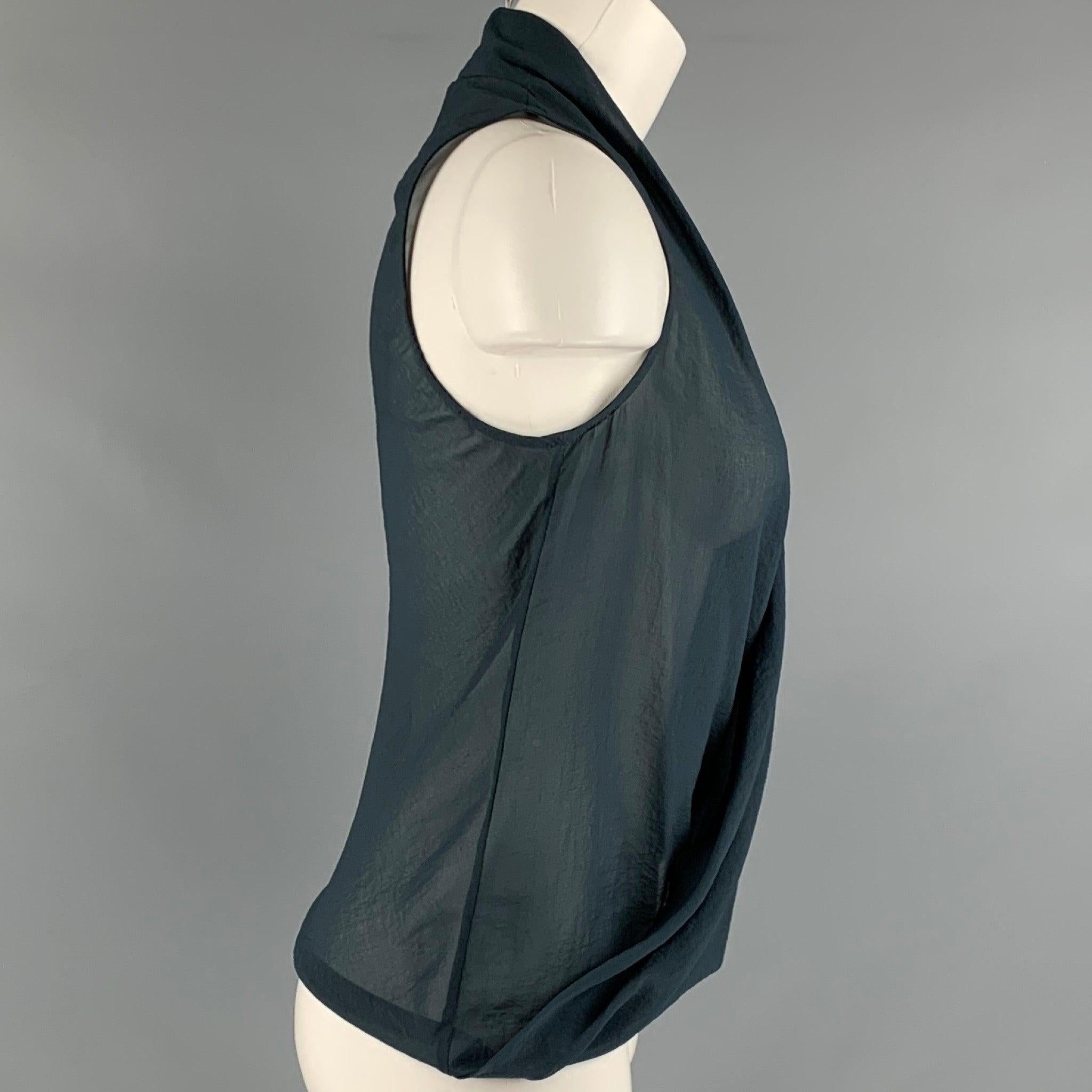 HELMUT LANG casual top in a grey polyester fabric featuring a sleeveless faux wrap style.Very Good Pre-Owned Condition. Minor signs of wear. 

Marked:   S 

Measurements: 
 
Shoulder: 11 inches Bust: 38 inches Length: 22.5 inches 
  
  
 
Reference: