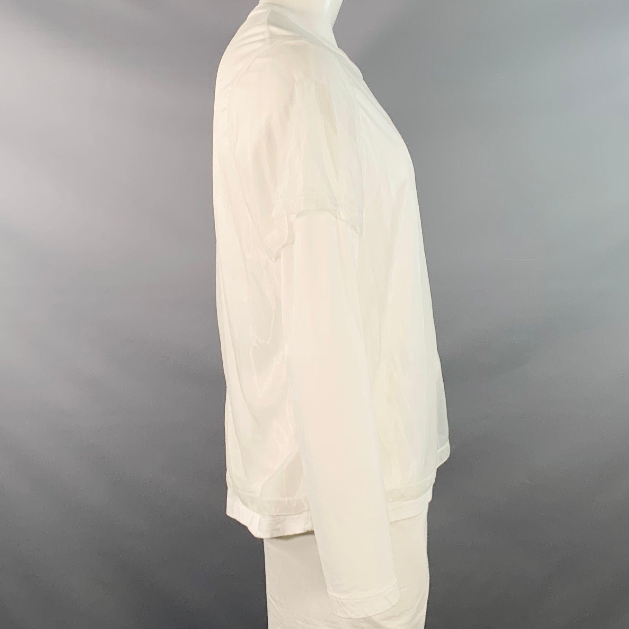 HELMUT LANG pullover
in a white cotton jersey featuring a double layered style with sheer polyamide chiffon 