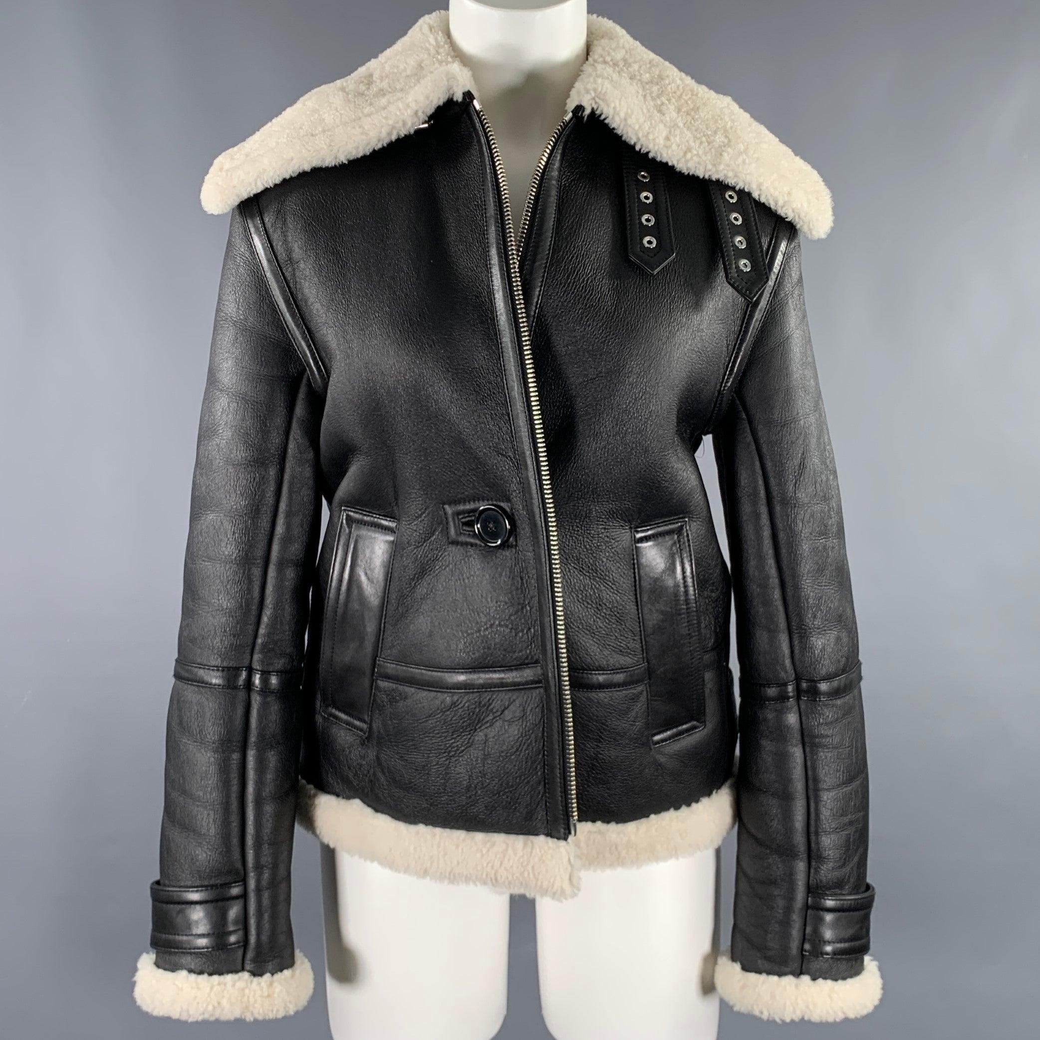 HELMUT LANG jacket
in a black lambskin leather fabric featuring a bomber style, large shearling lapel, and zip up closure with optional single button closure.Excellent Pre-Owned Condition. 

Marked:   XS 

Measurements: 
 
Shoulder: 17.5 inches