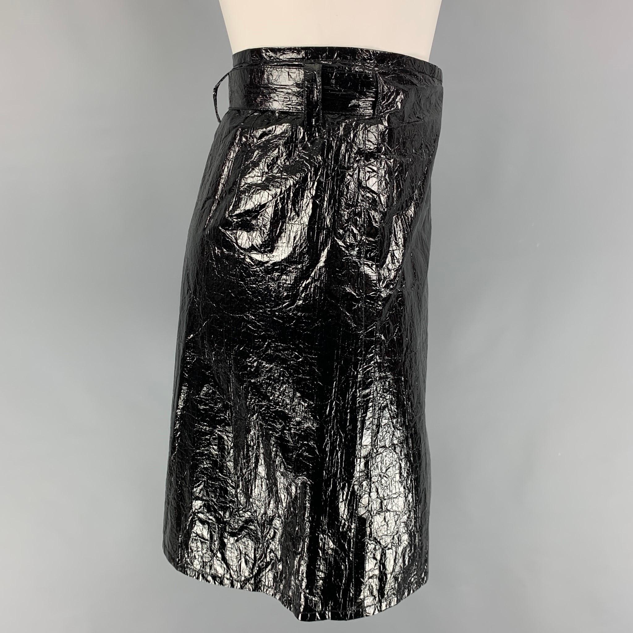 HELMUT LANG skirt comes in a black wrinkled polyurethane featuring a wrap style, adjustable belt, and a single button closure. 

New With Tags.
Marked: XS
Original Retail Price: $425.00

Measurements:

Waist: 26 in.
Hip: 34 in.
Length: 18 in. 