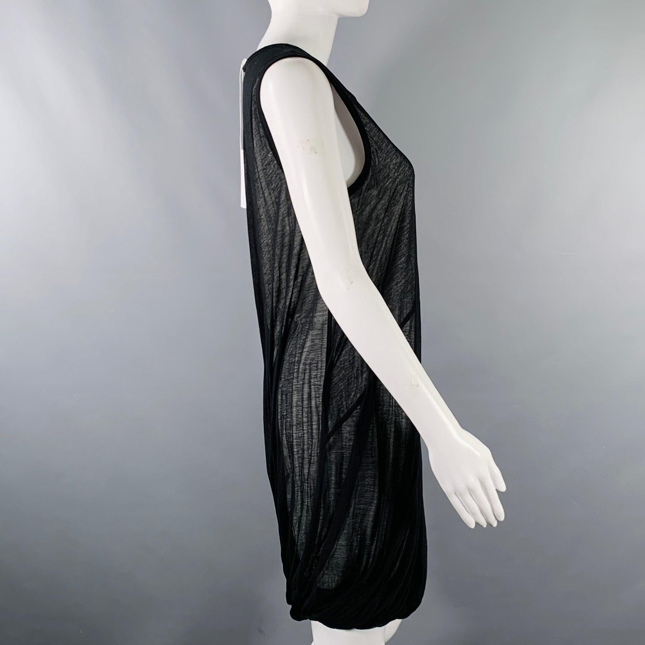 HELMUT LANG dress
in a black and white cotton featuring a sheer black top layer, sleeveless style, and bubble hem. New with Tags. 

Marked:   XS 

Measurements: 
 
Shoulder: 12.5 inches Bust: 34 inches Waist: 32 inches Hip: 34 inches Length: 35