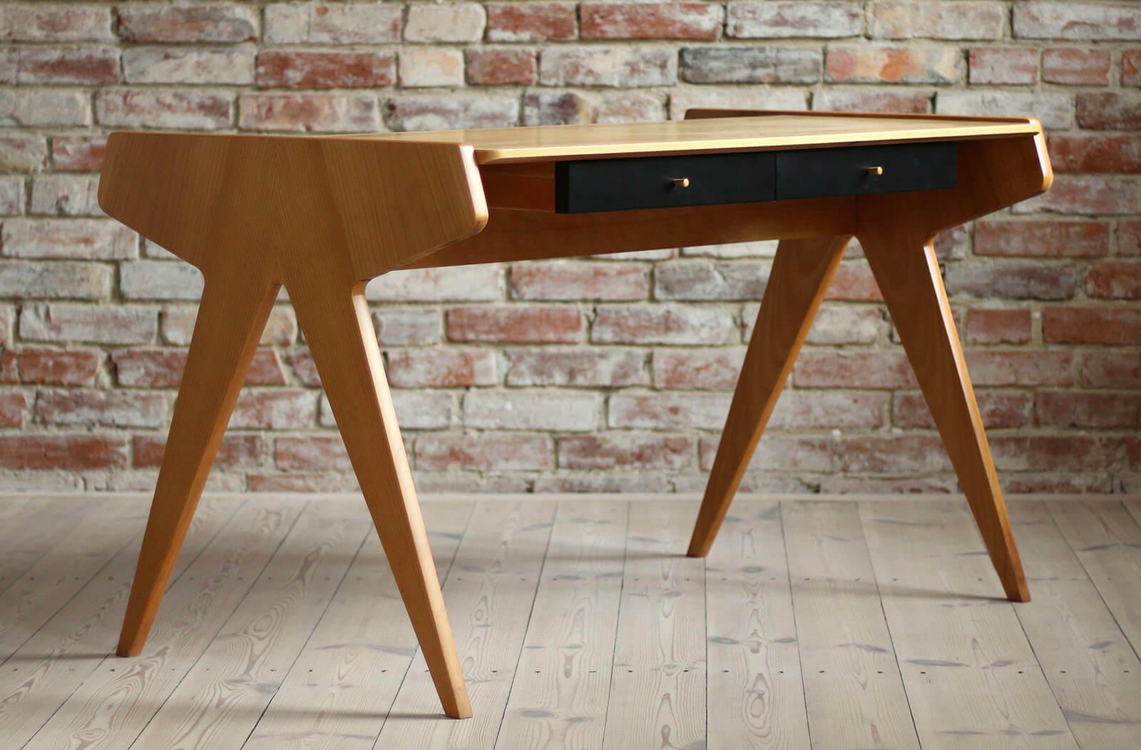 This desk was designed by Helmut Magg in 1950s and produced by Neue Gemeinschaft für Wohnkultur, WK Möbel and still has the original label in one of the drawers. The design is simple yet very elegant. It features a section with 2 drawers on one side