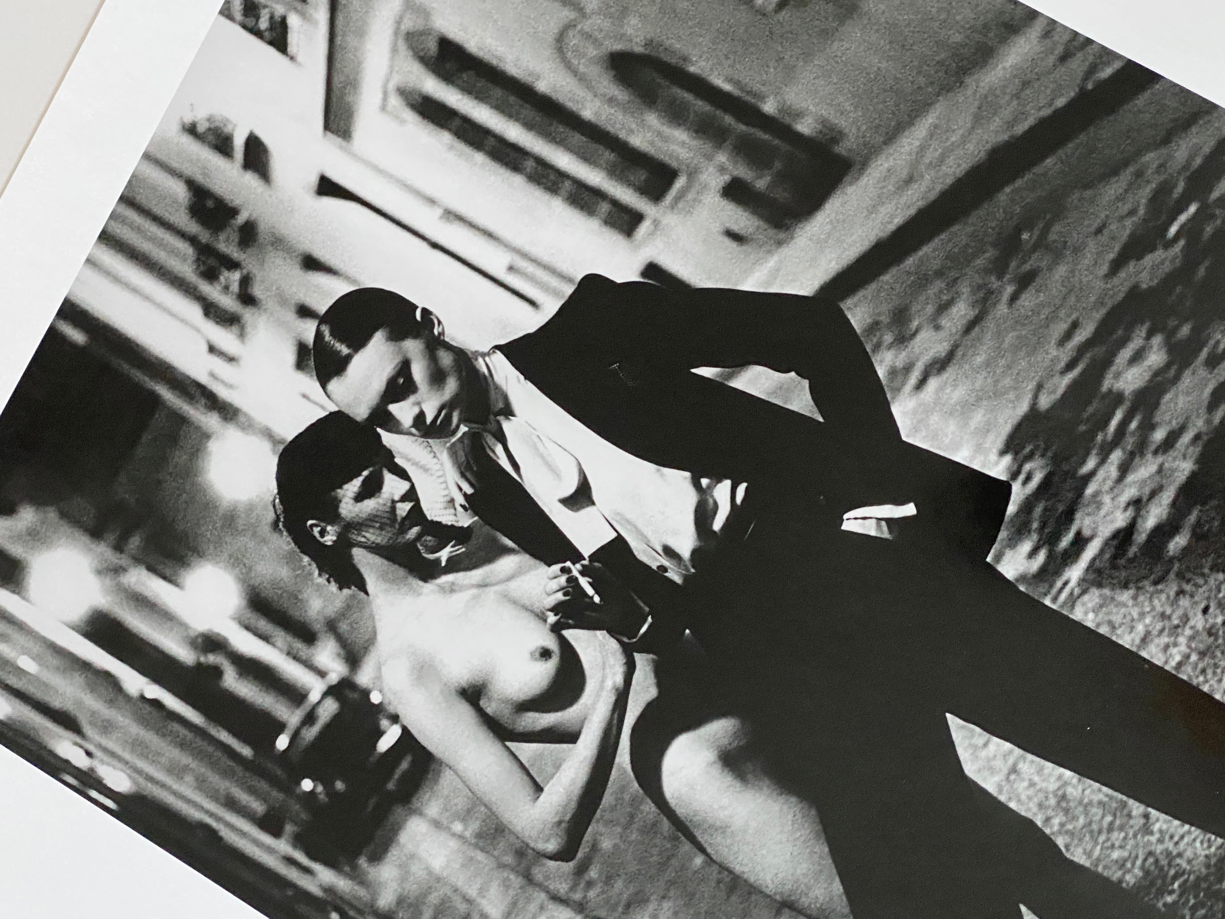 Helmut Newton, 'Rue Aubriot', 1975 Signed Original Silver Gelatin Print. 
To the trade pricing
Black and White Photography / Contemporary Photography

HELMUT NEWTON (1920–2004)
Yves St. Laurent, Rue Aubriot, French Vogue, Paris, 1975
gelatin silver