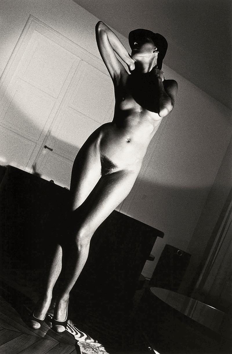Helmut Newton Black and White Photograph - Jenny in My Apartment