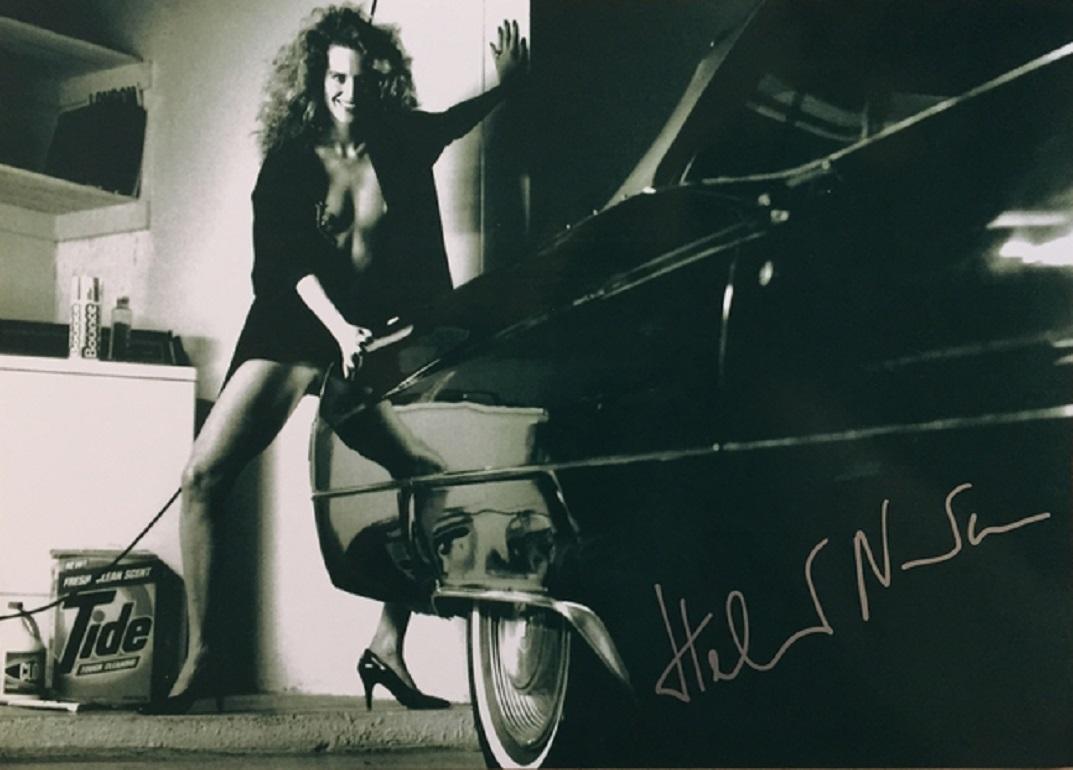 Woman and Cadillac - Print by Helmut Newton