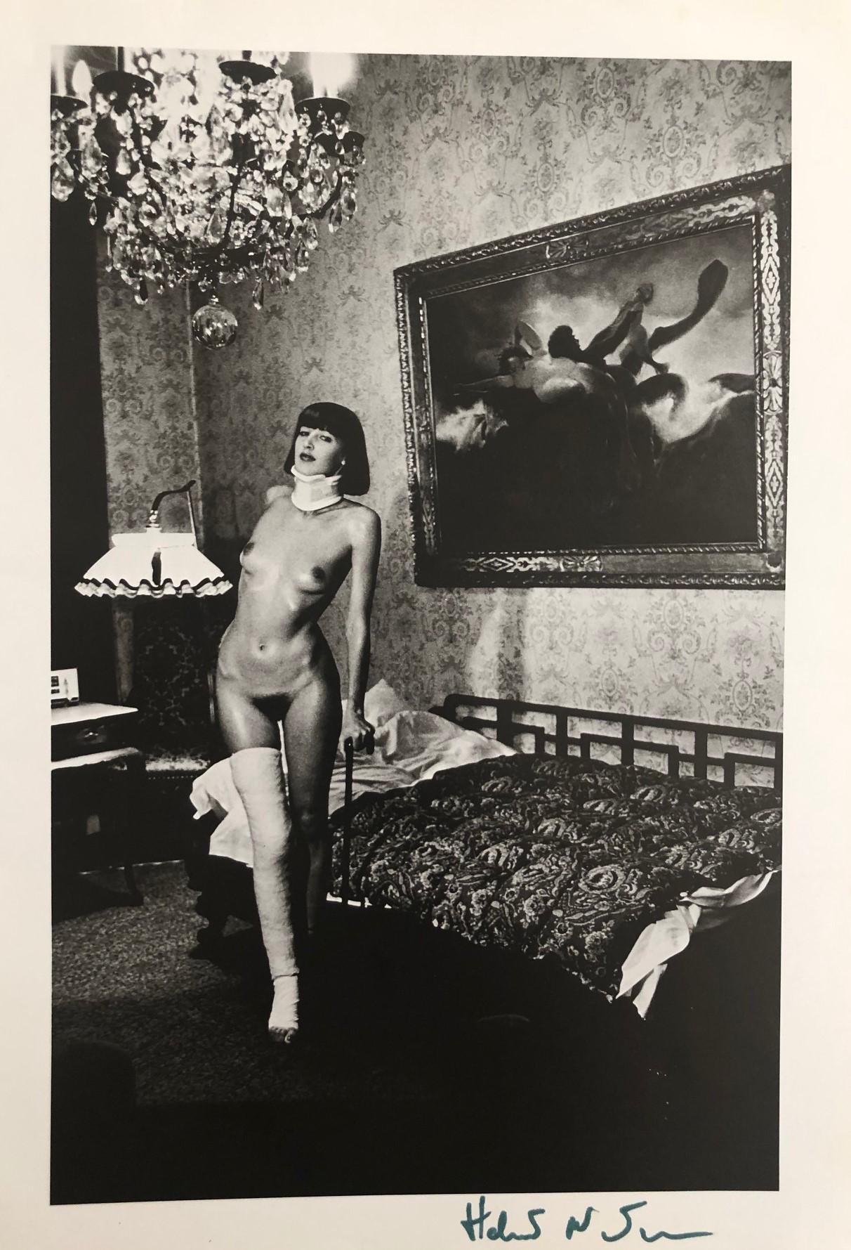 Signed black & white photo-lithography by Helmut Newton, circa 1977. Signed in black ink on the lower right; annotations on verso. The piece is in very good condition and measures 10.75