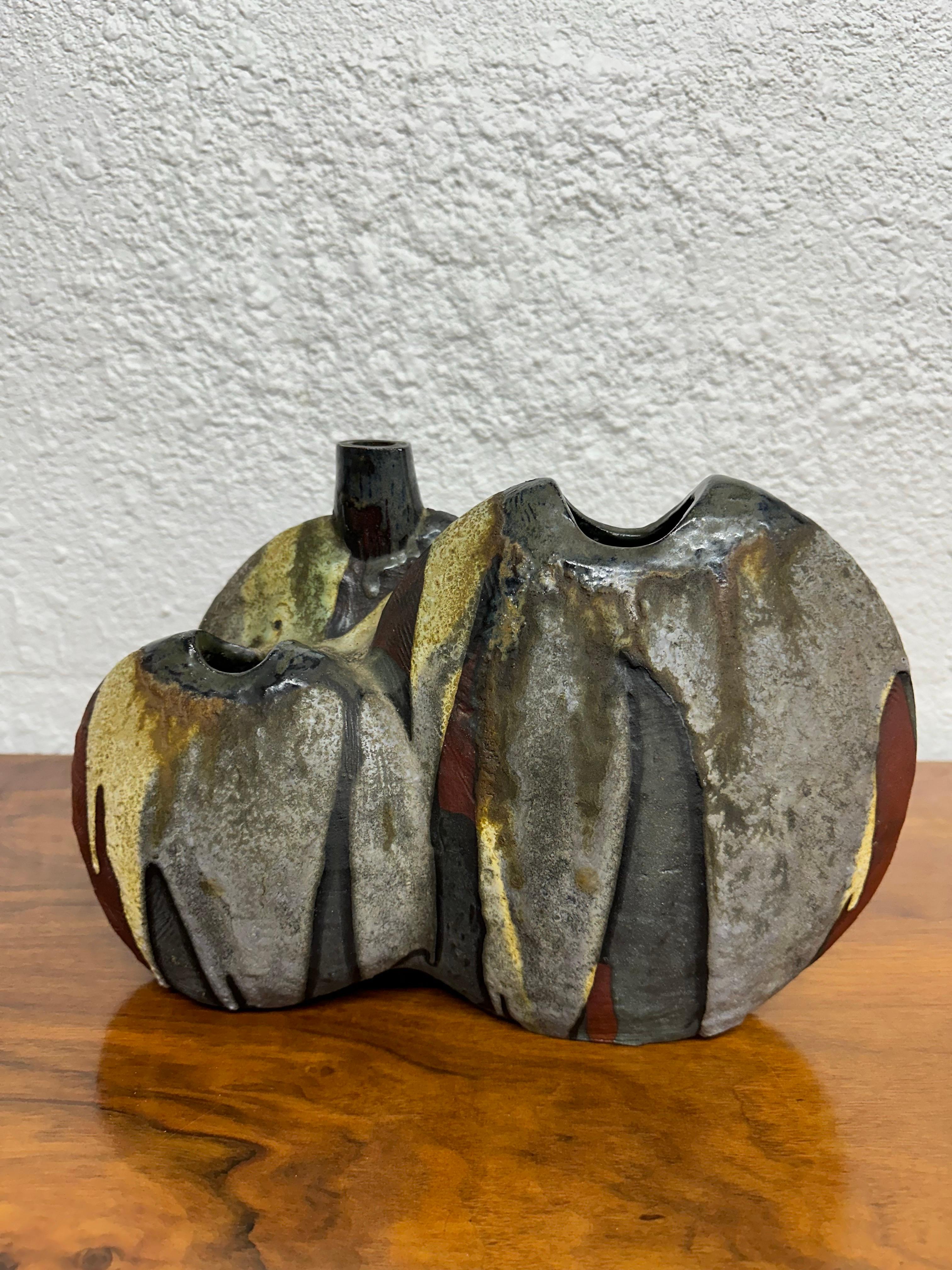 Large triple vase by Helmut Schäffenacker, harder to find larger size plaster cast model 502. Lovely textured drip glaze in oxblood, grey, tan and black. Excellent condition, no chips or cracks, a few small air bubbles in glaze from manufacturing