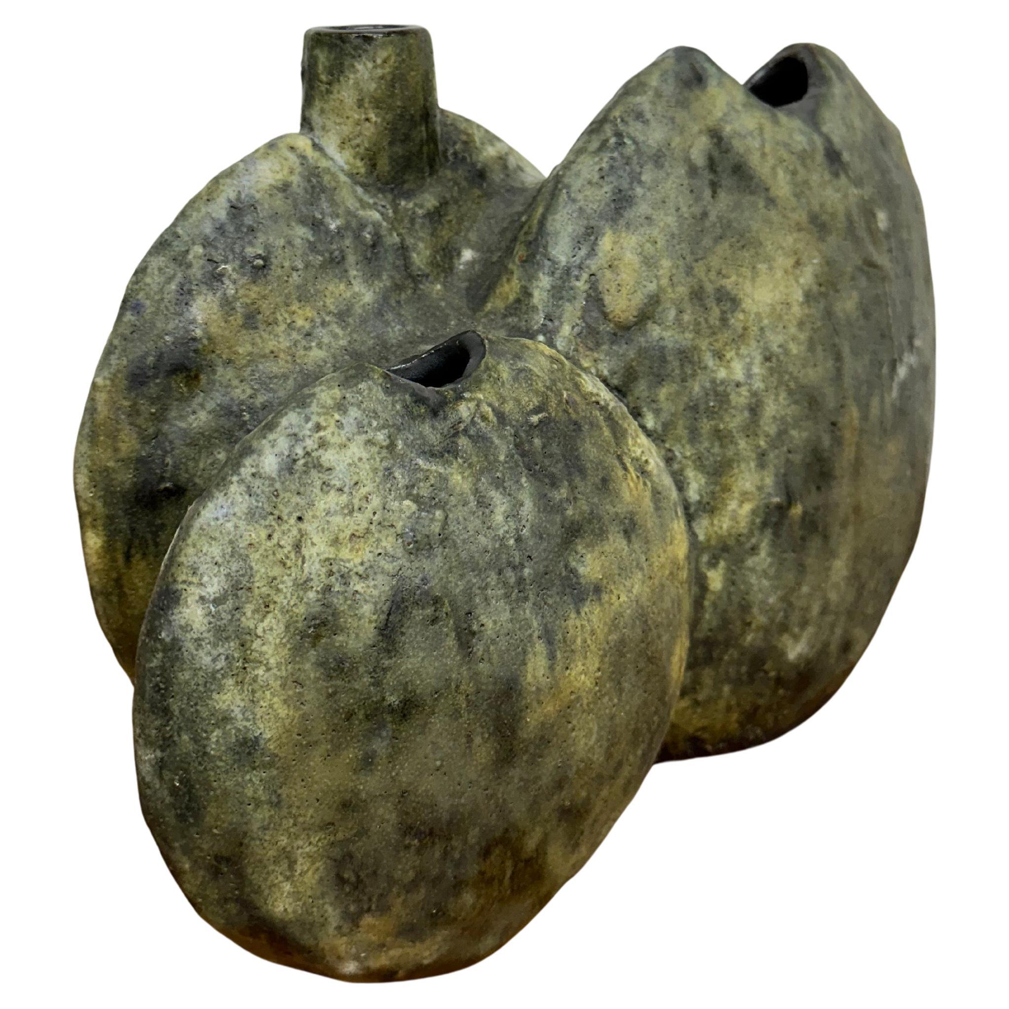 Large triple vase by Helmut Schäffenacker, harder to find larger size plaster cast model 502. Earthy glaze in green, grey, tan and. Excellent condition, no chips or cracks, a few small air bubbles in glaze from manufacturing process. 12.75”W x 8”H x